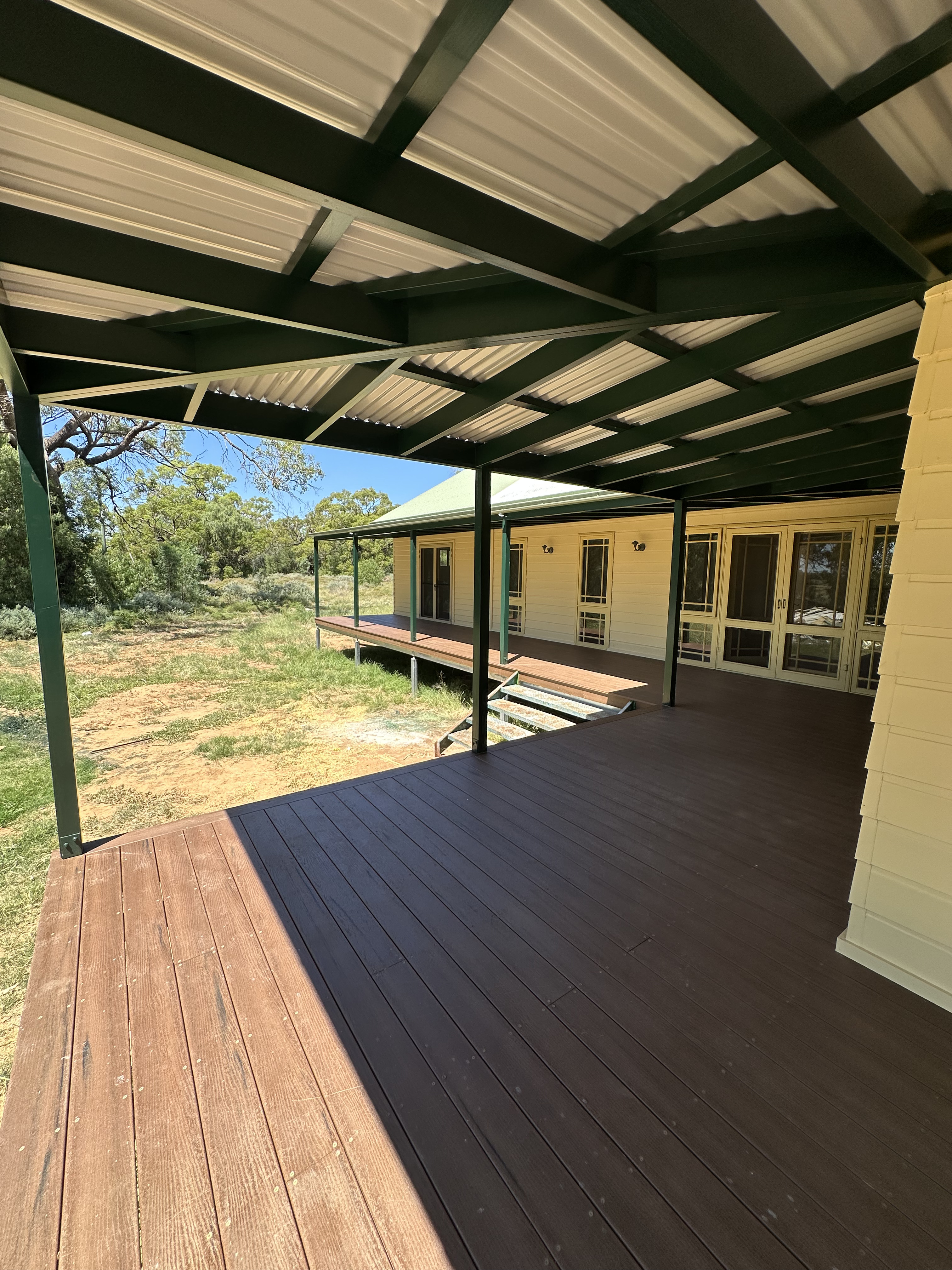 New home extension living area with large windows and clean finishes in Warren