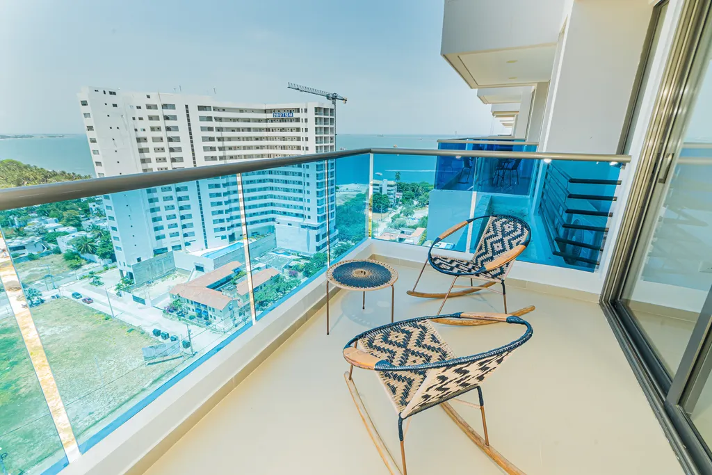 Balcón privado en el piso 15 con vista panorámica al Mar Caribe