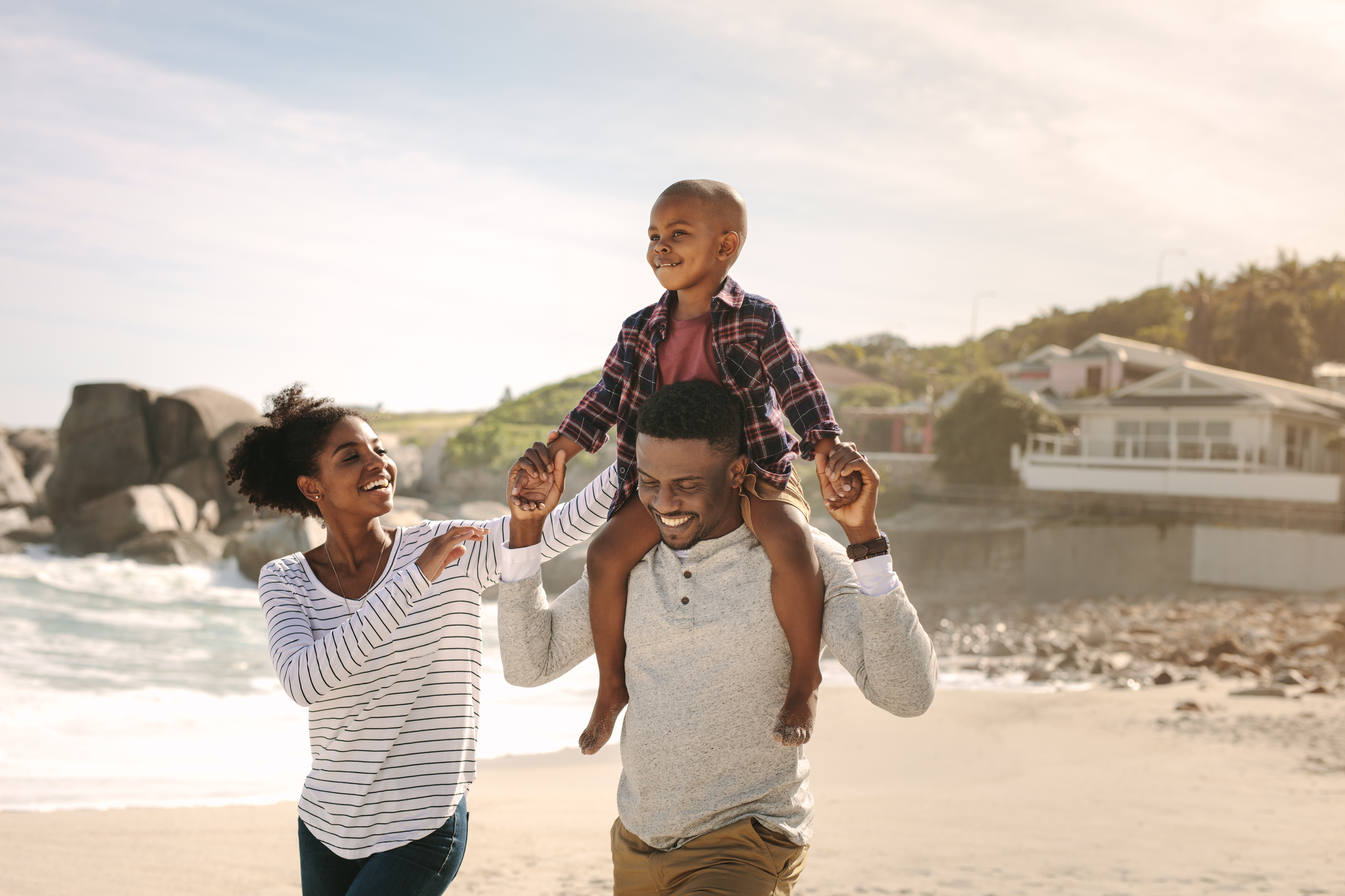 Happy family at beach — Be Free University community