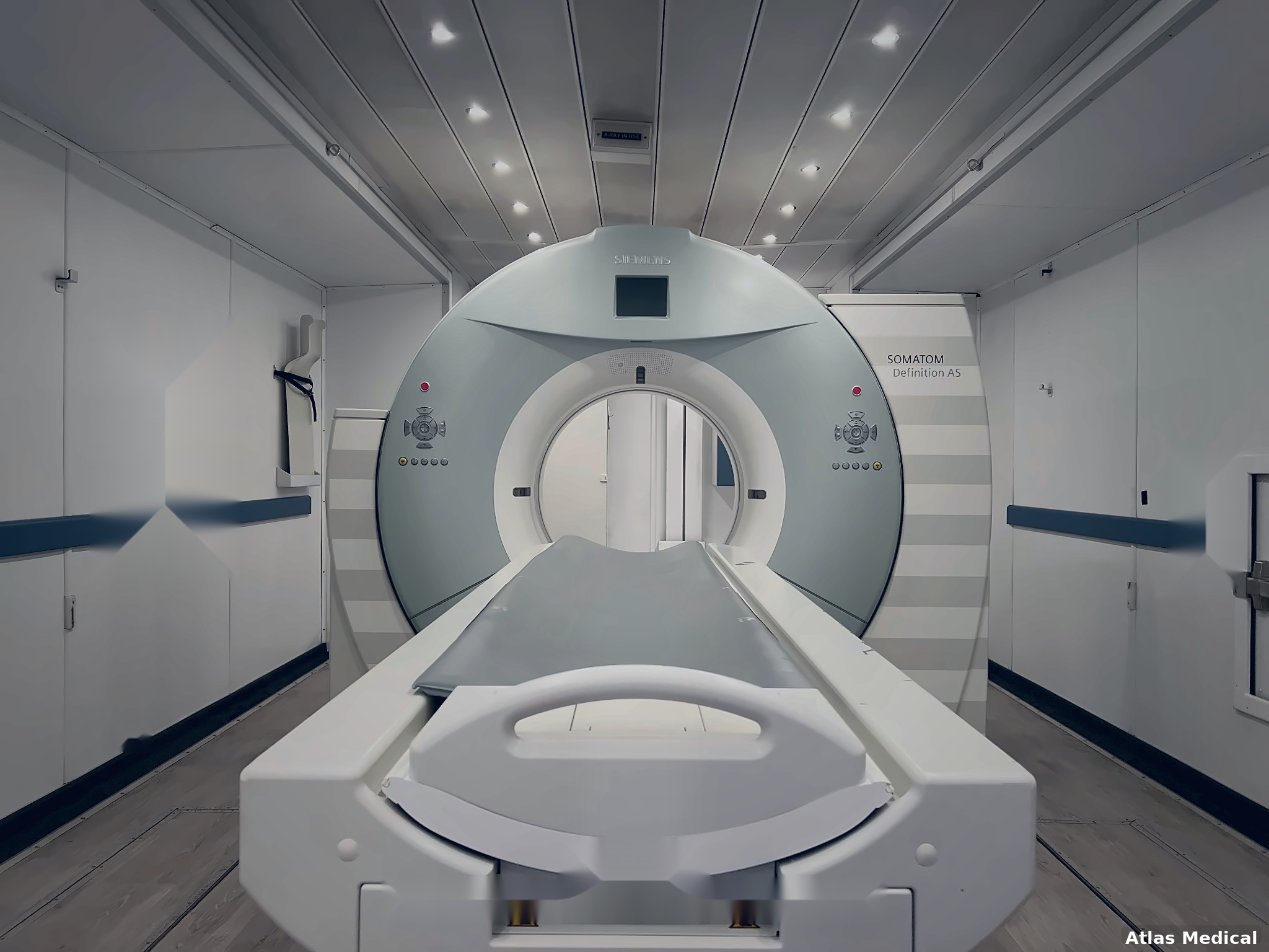 Atlas Medical CT imaging unit shown in an existing Atlas photograph.