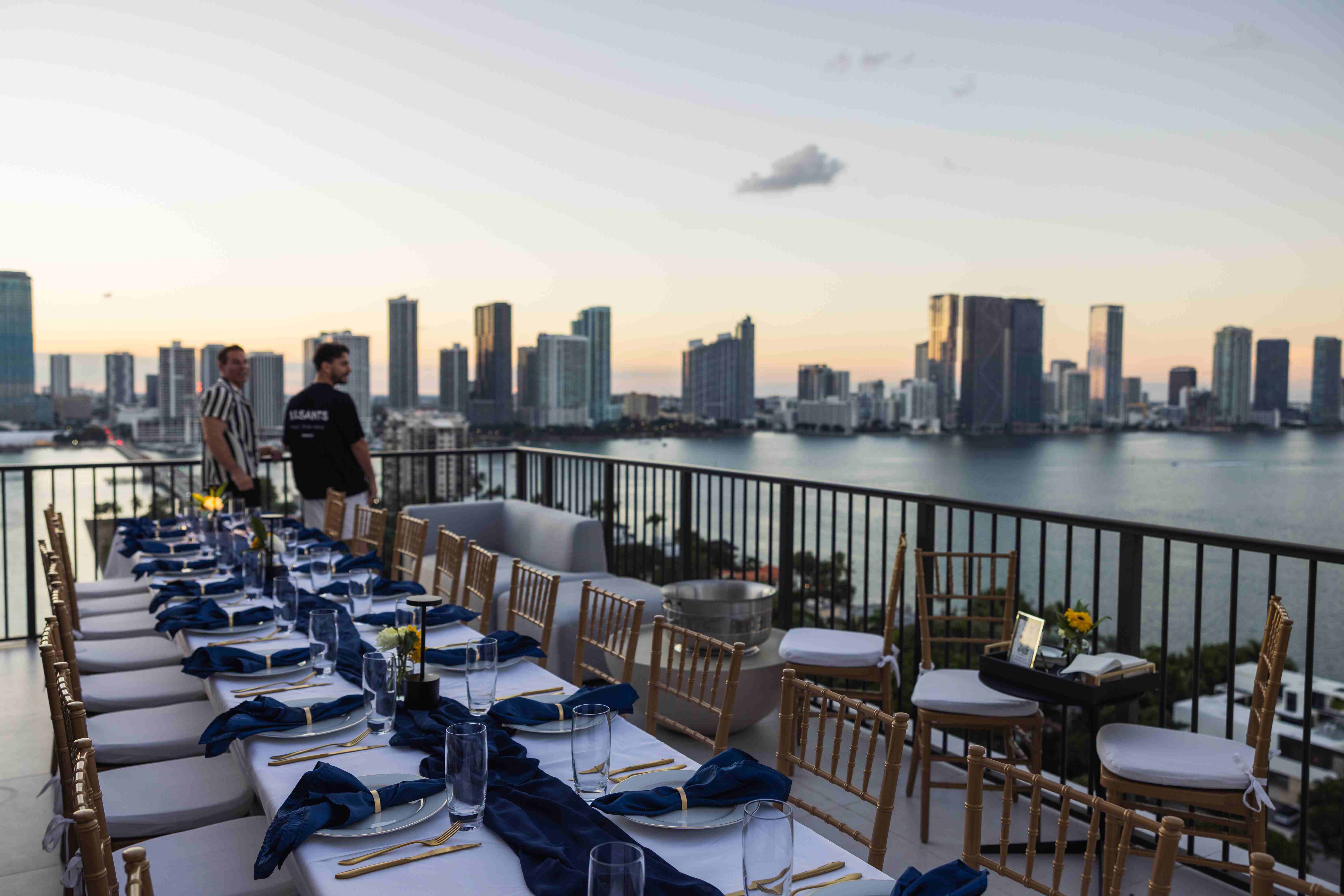Wide angle view of the Shabbat table and Miami skyline