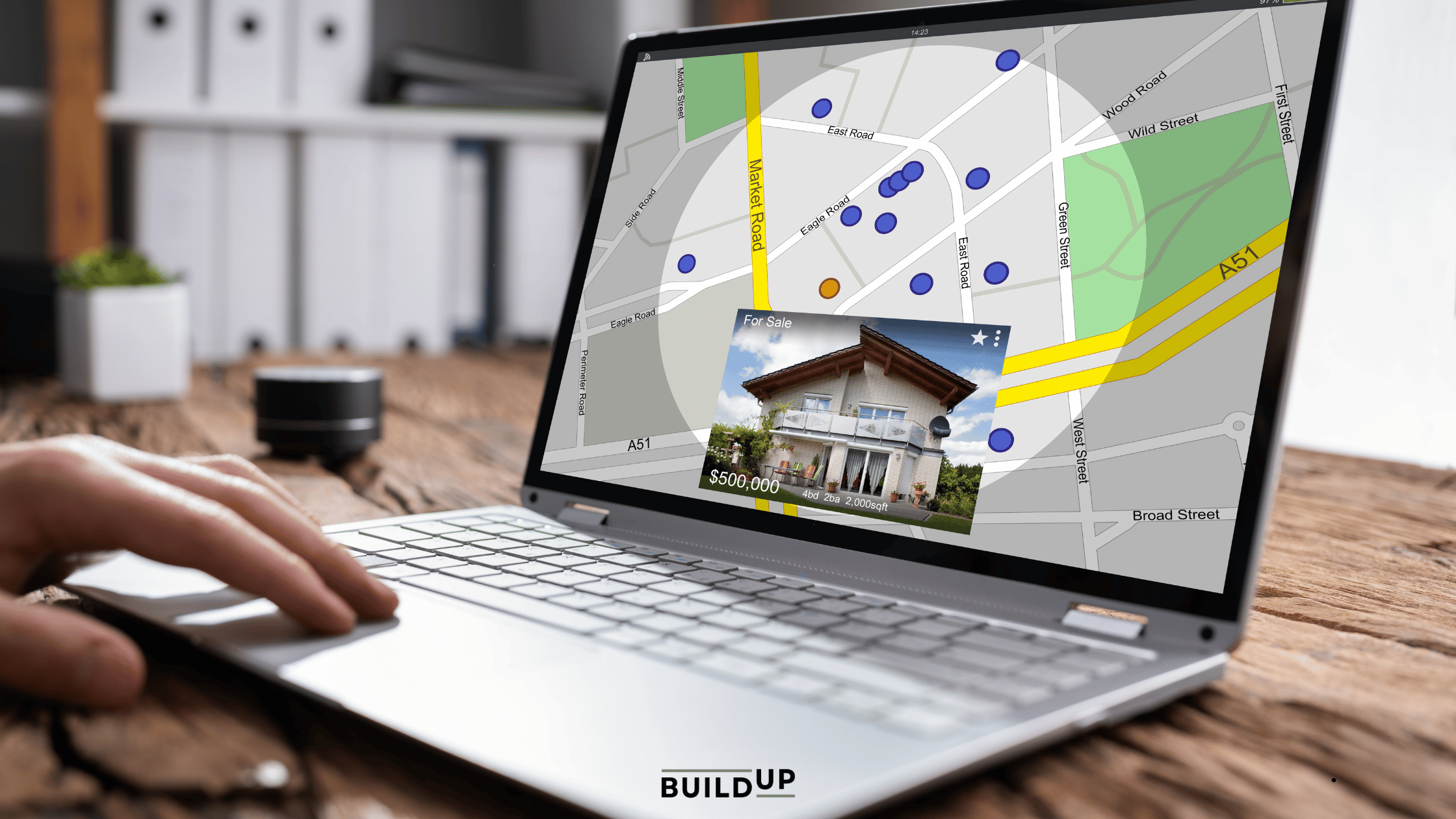 Heber customer searching for local business in laptop showing house and map pins.