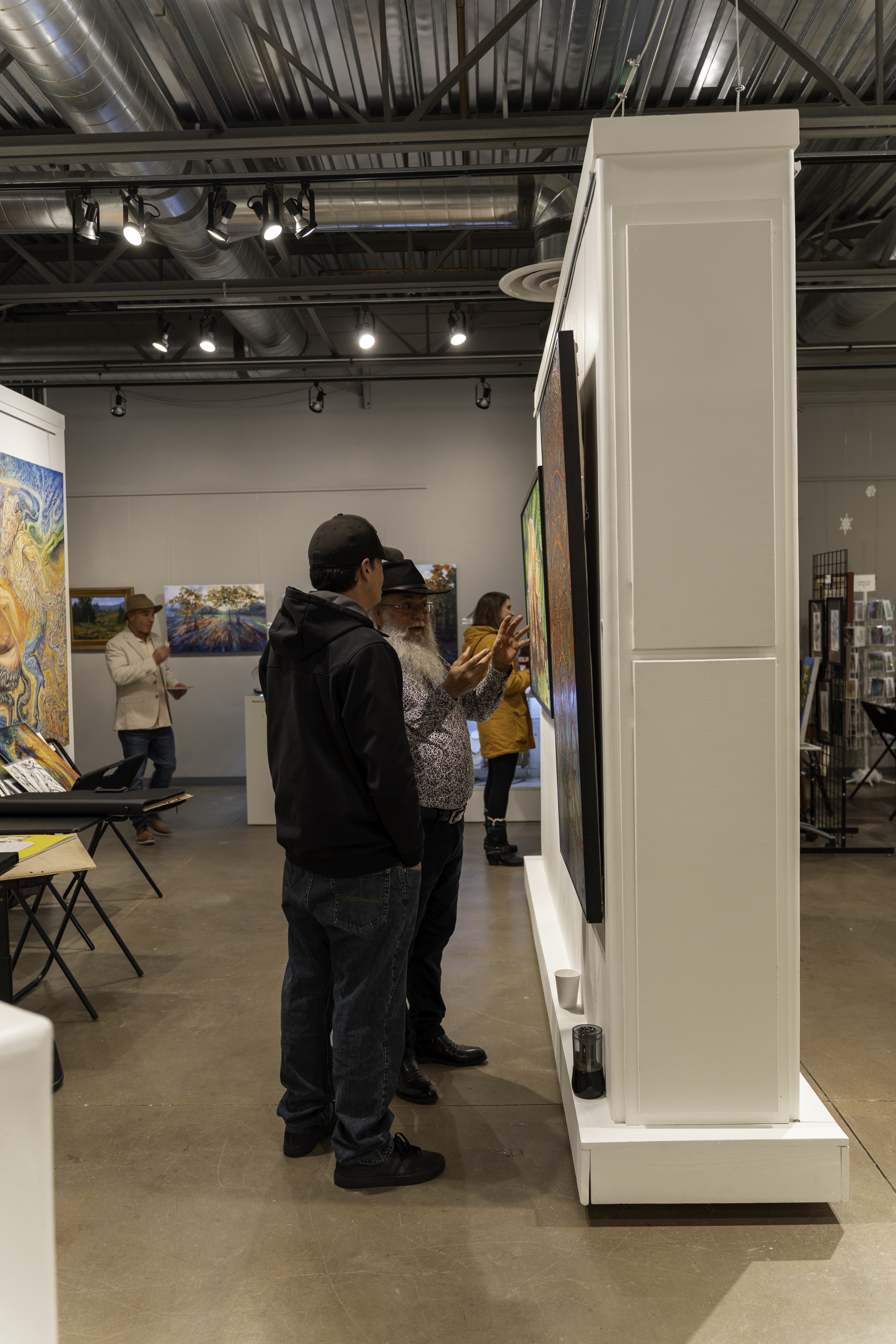 “gallery visitor connecting emotionally with original artwork”