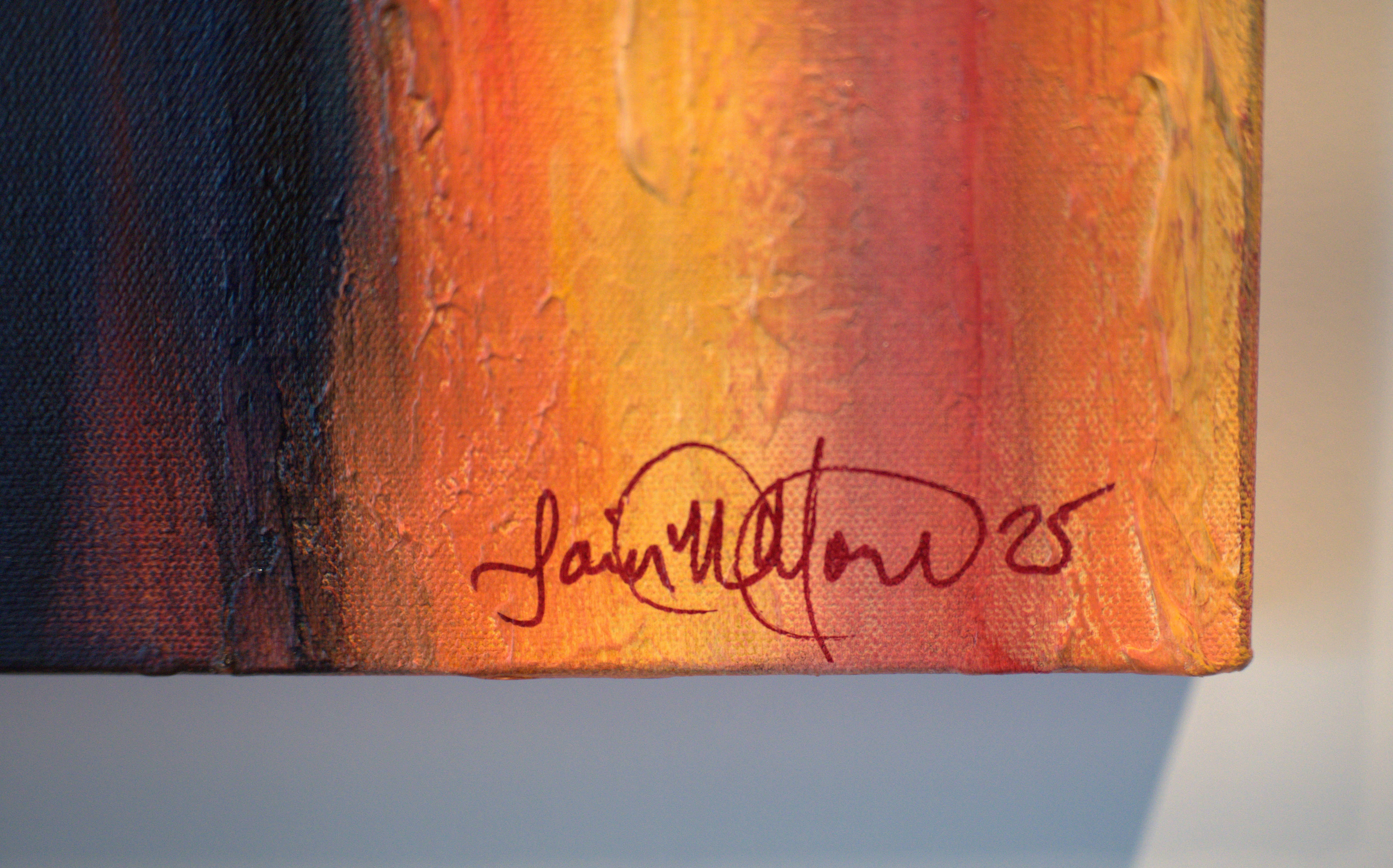 Close up of colorful abstract artwork showing brush texture and layered paint.