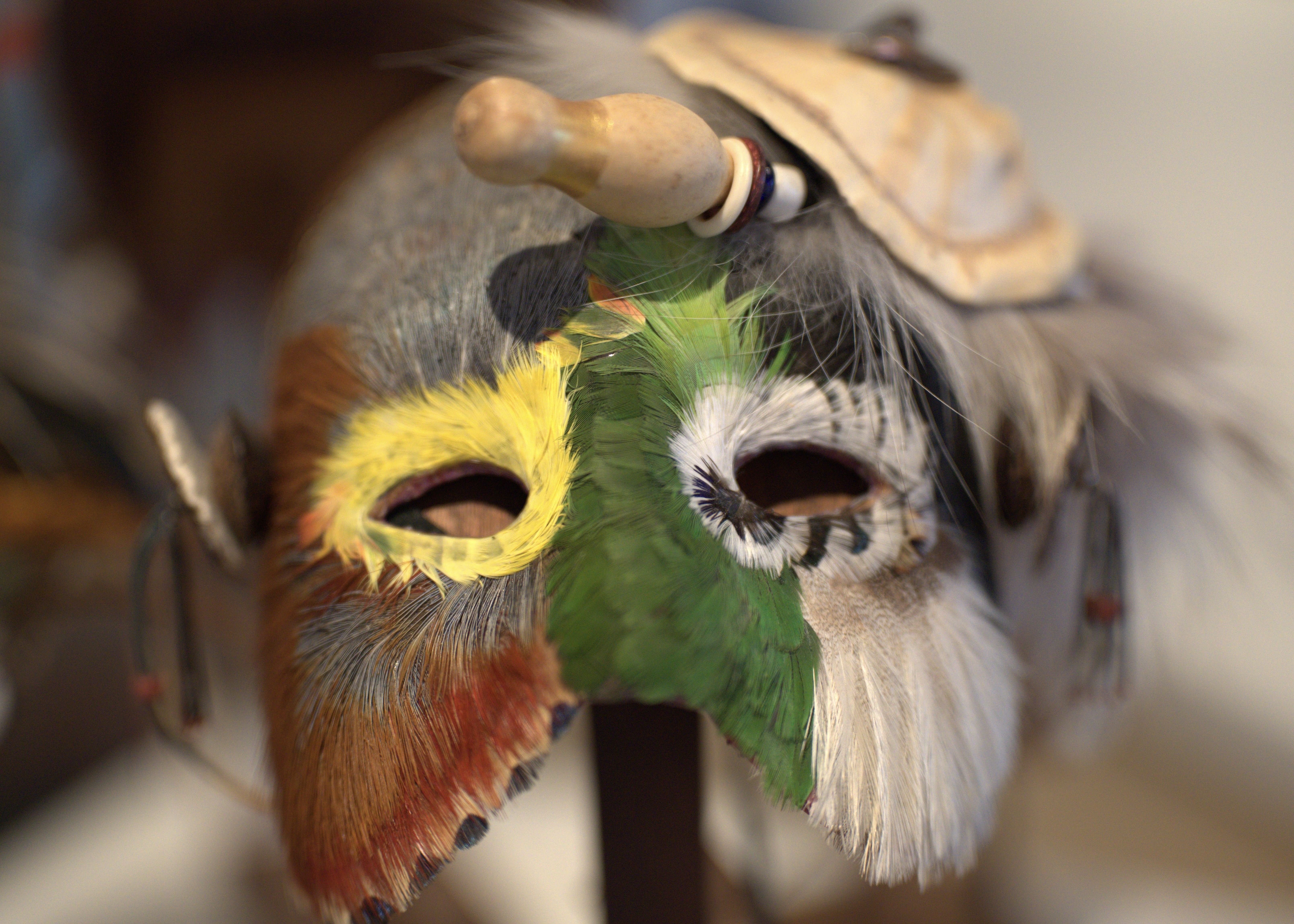 mixed media textured art with feathers and layered materials by Randy Rasmussen in Idaho art gallery