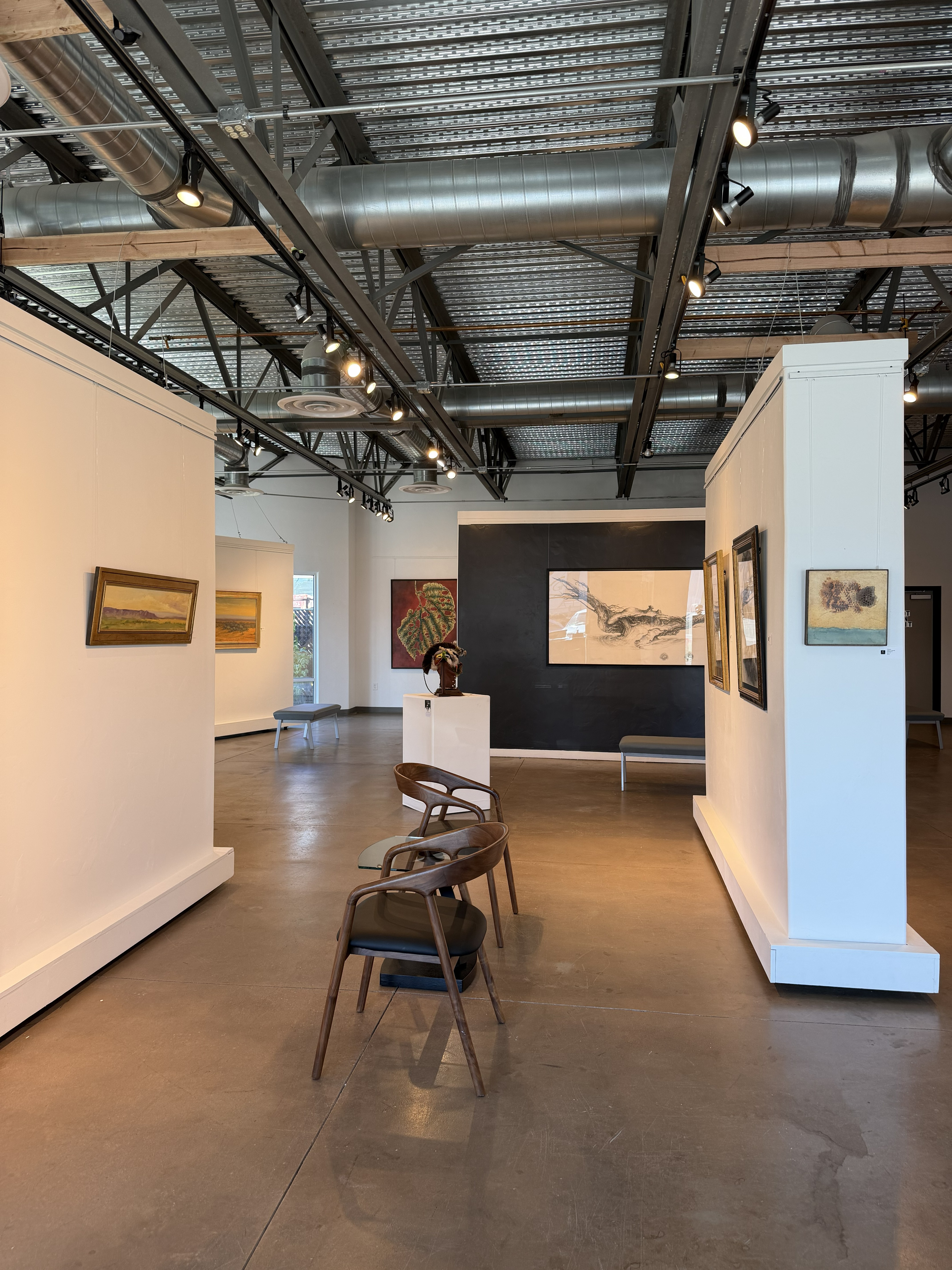 Art on display inside Create Gallery and Frames in Garden City, Idaho