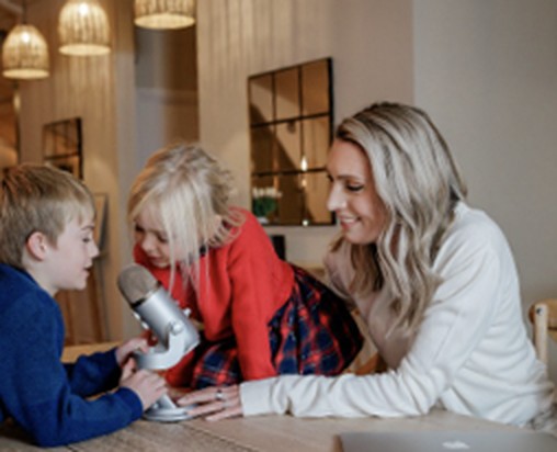 Carrie Green at home with her two children