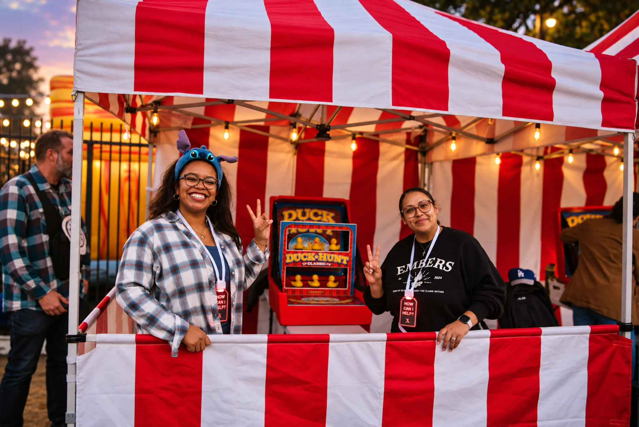 Carnival games and volunteers at Shine Fest