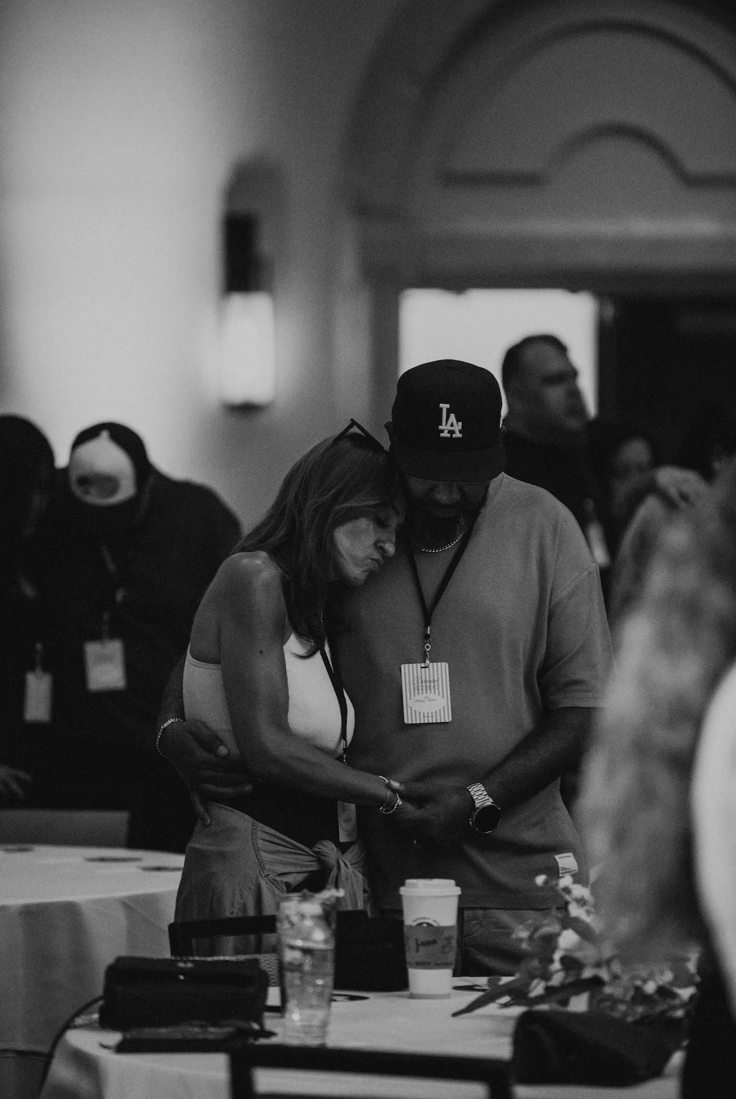 Couple praying together at the Devoted Marriage Retreat