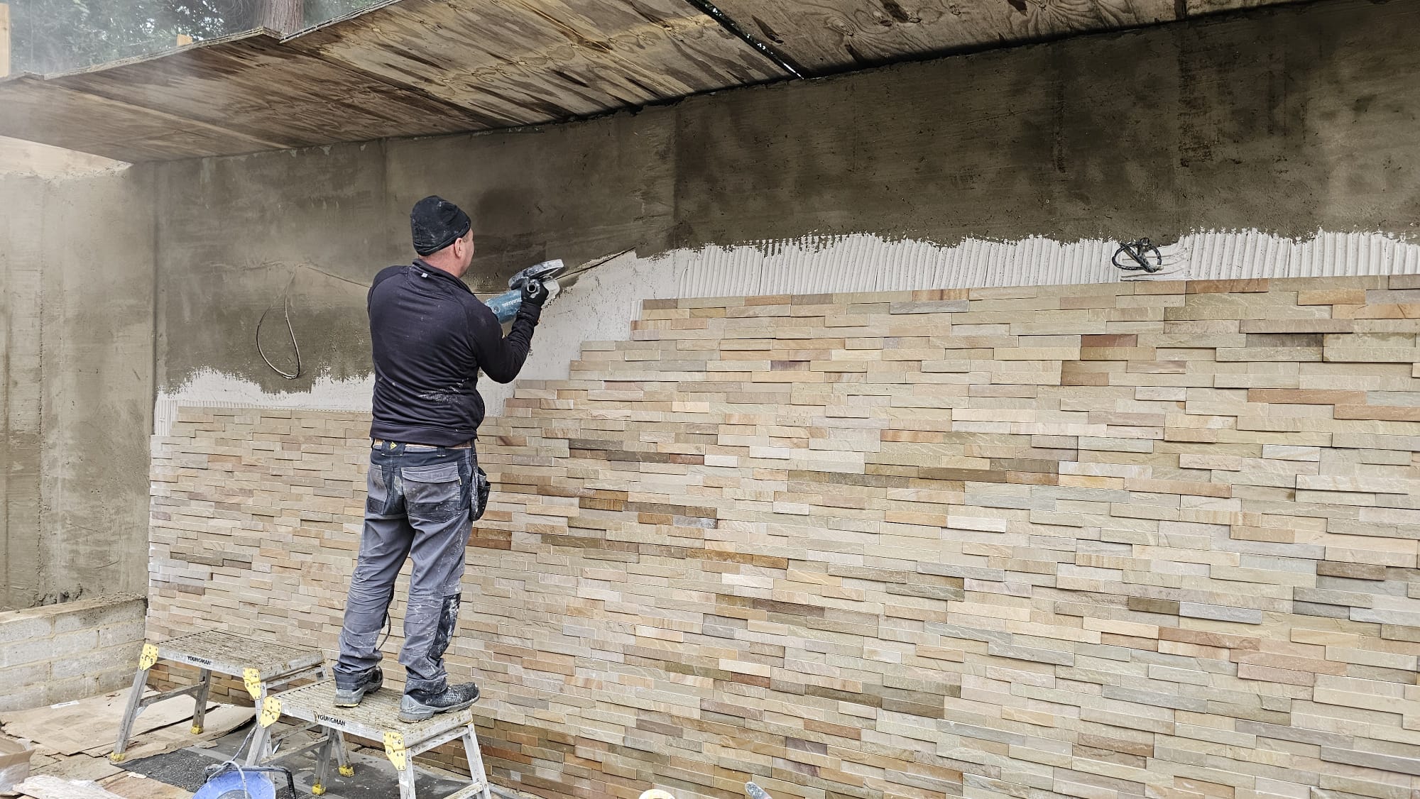 Wall plastering in progress