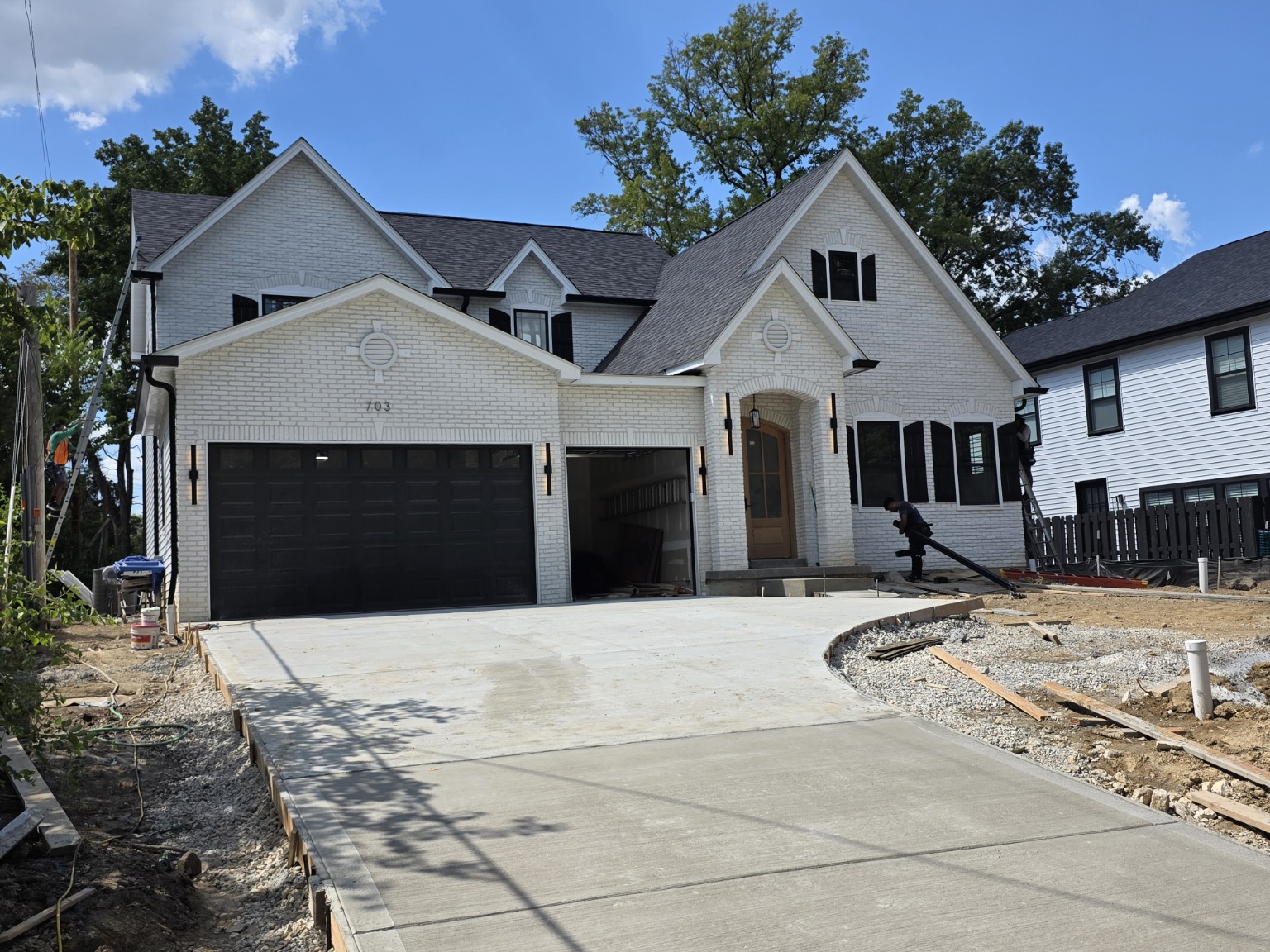 Full-house view of completed black gutters in Kirkwood Missouri