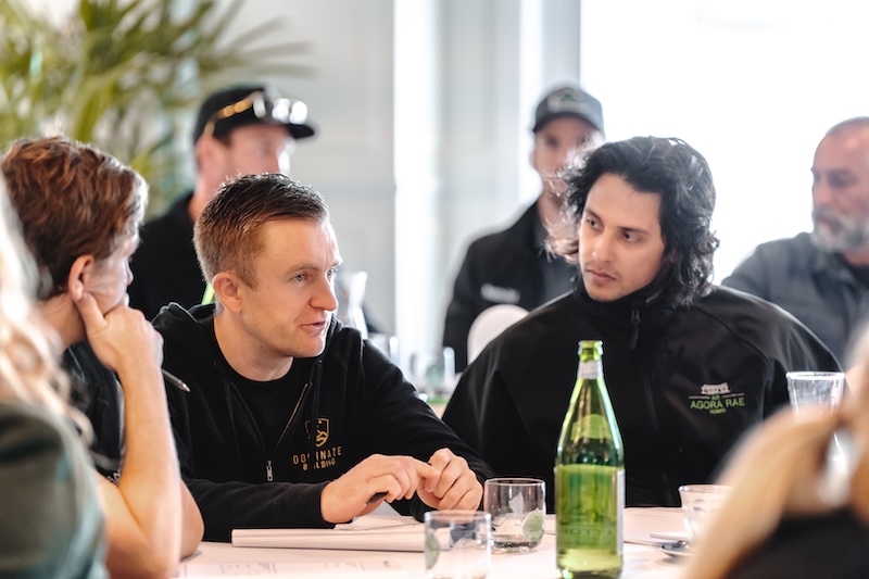 Builders in discussion at the summit