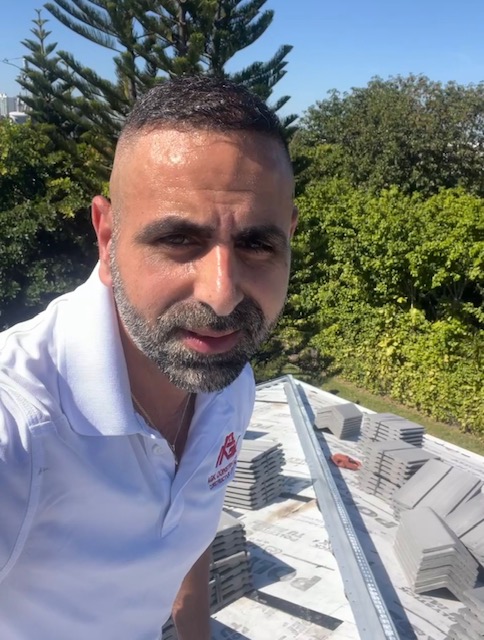 Concrete tile staged on roof deck before installation — AGK Construction South Florida
