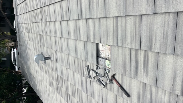 Broken tile roof damage requiring repair — AGK Construction South Florida