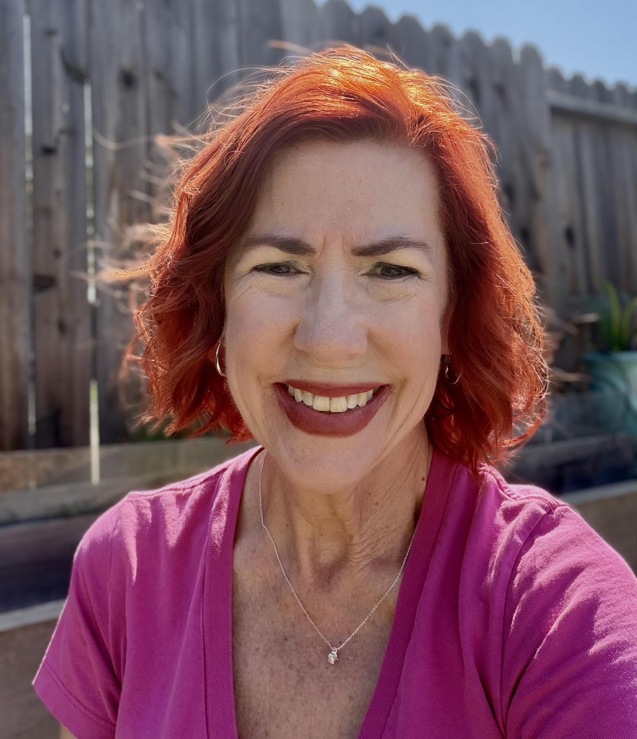 Monica Goodpaster smiling outdoors in the sunshine