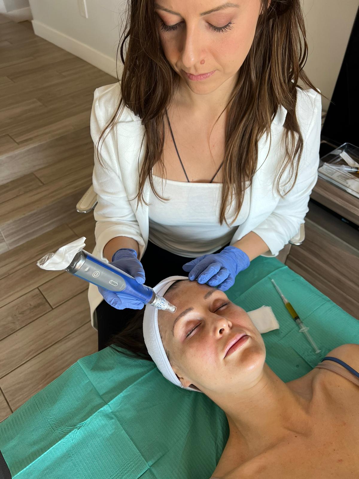 Dr. Svetlana performing a natural aesthetics treatment