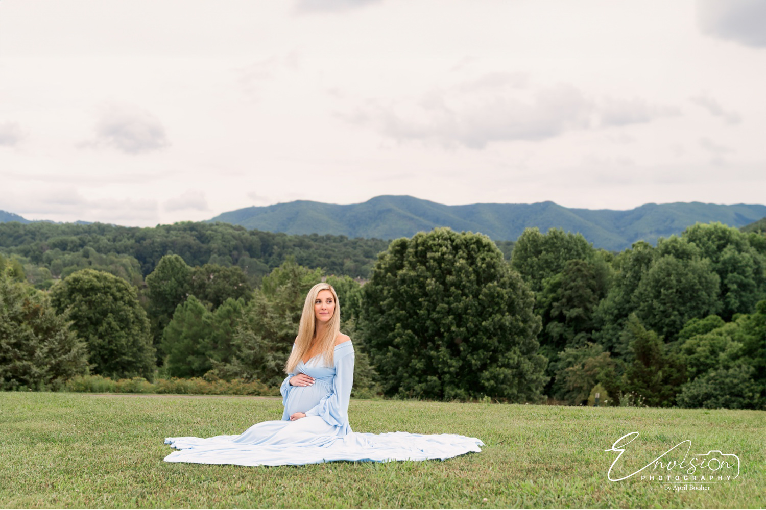 Expectant parents enjoying maternity photos at Willow Springs Park