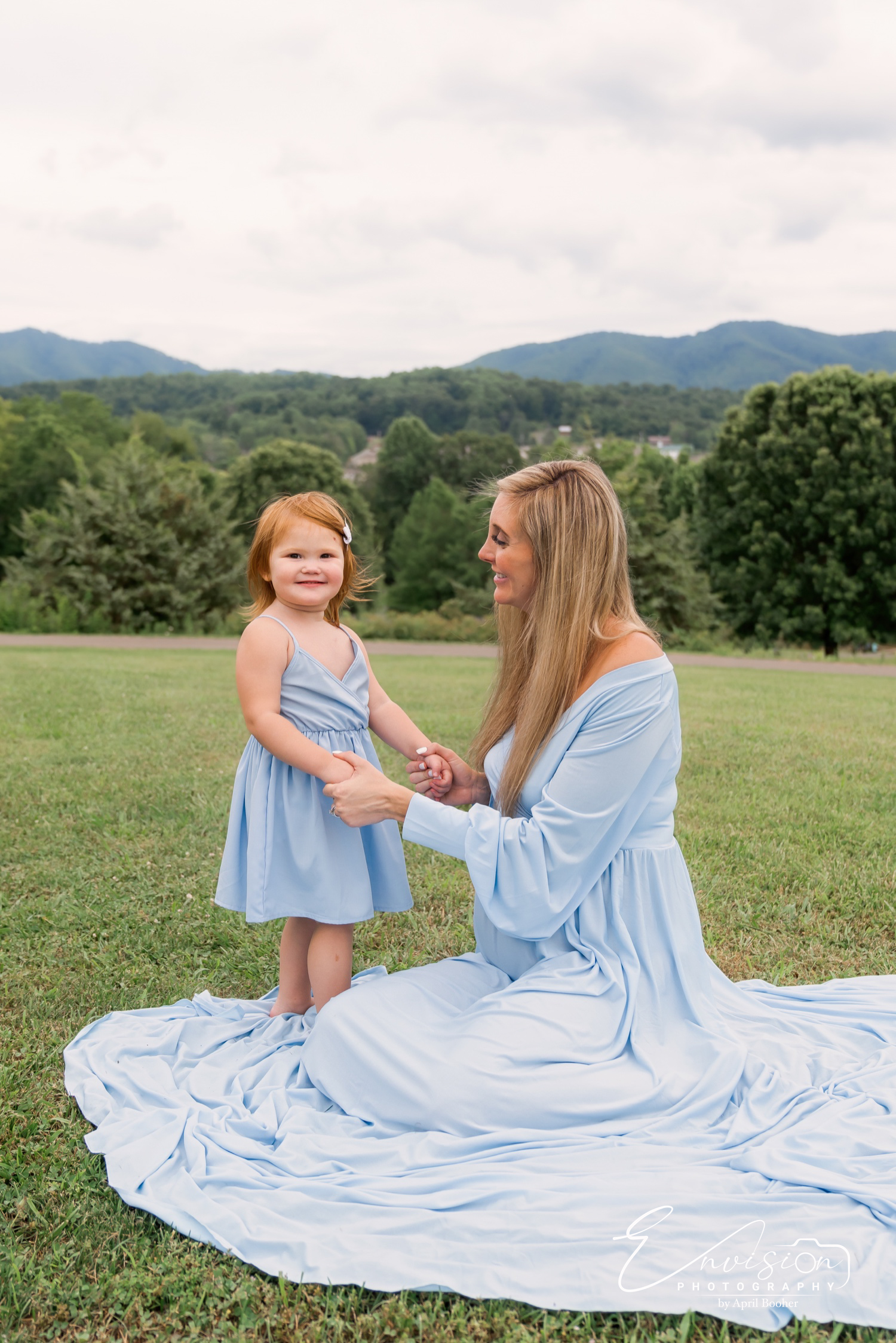 Family celebrating the anticipation of a new baby in Johnson City