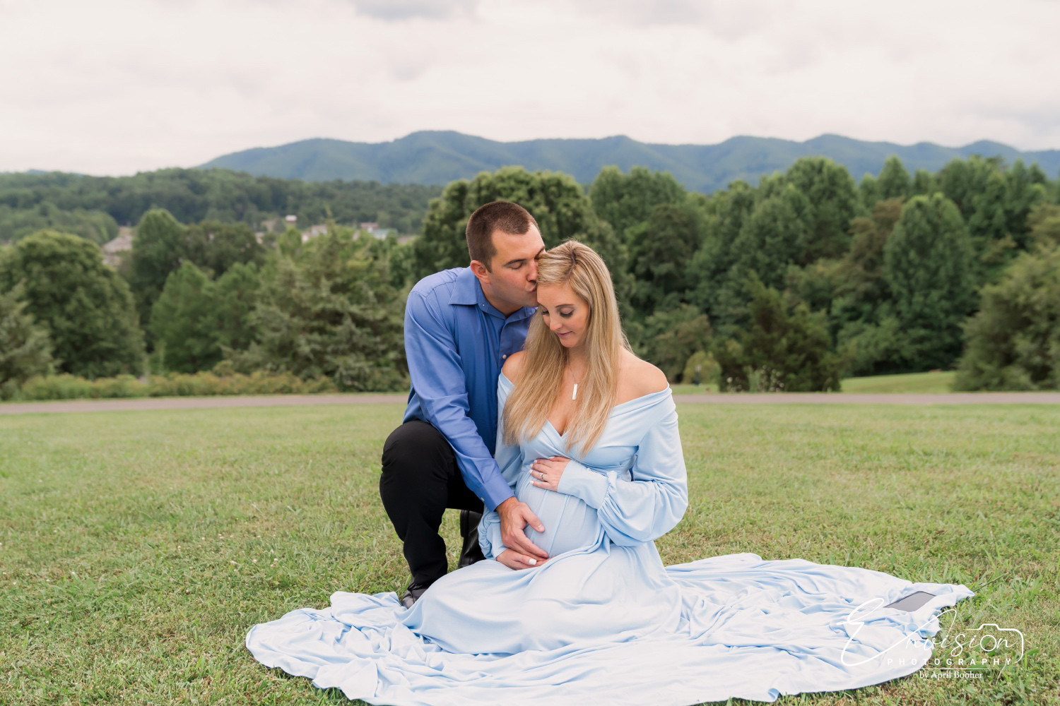 Sibling participating in a family maternity photography session