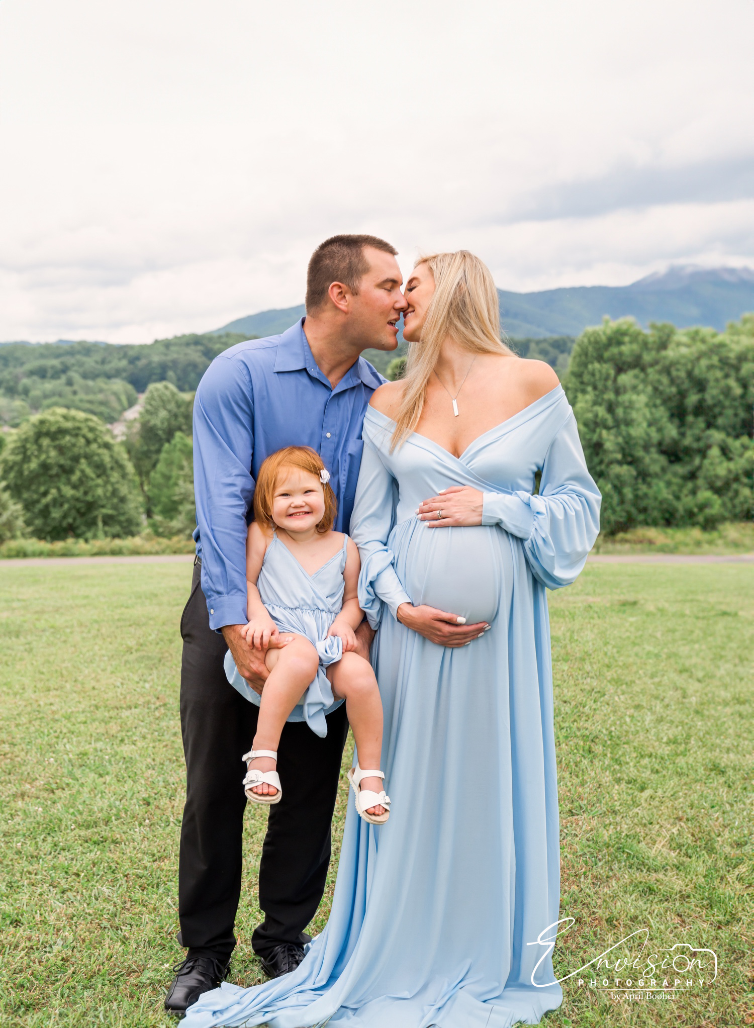 Joyful family maternity portrait at Willow Springs Park