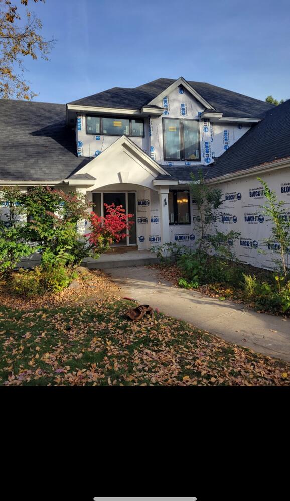 Custom home exterior photo 11