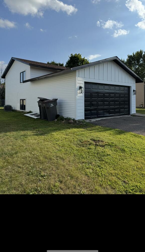 Custom home exterior photo 17