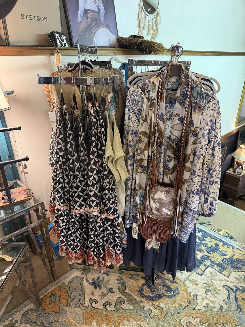 Boho print dresses and blouses on racks at Horse Feathers Mercantile in Dillsboro NC