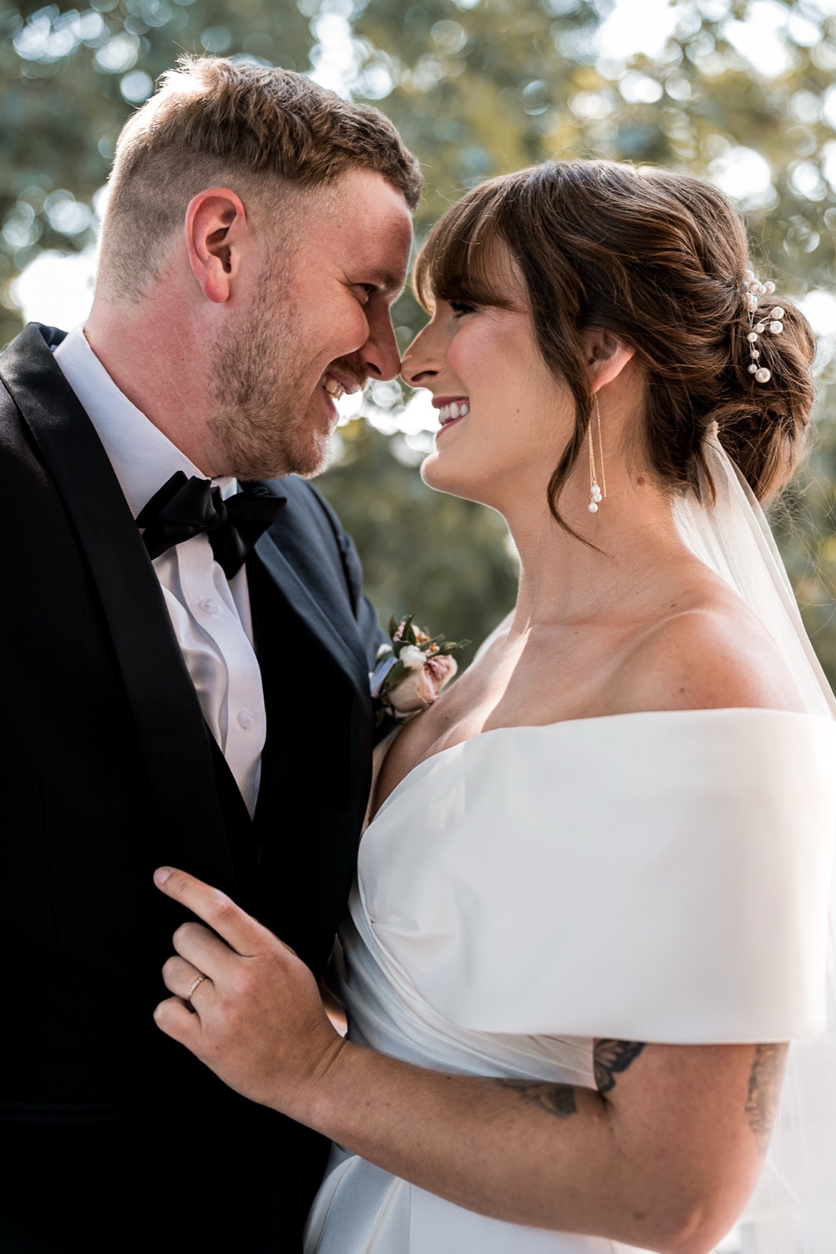 Bride and groom share an outdoor portrait at Bent Oaks Manor in Roanoke.