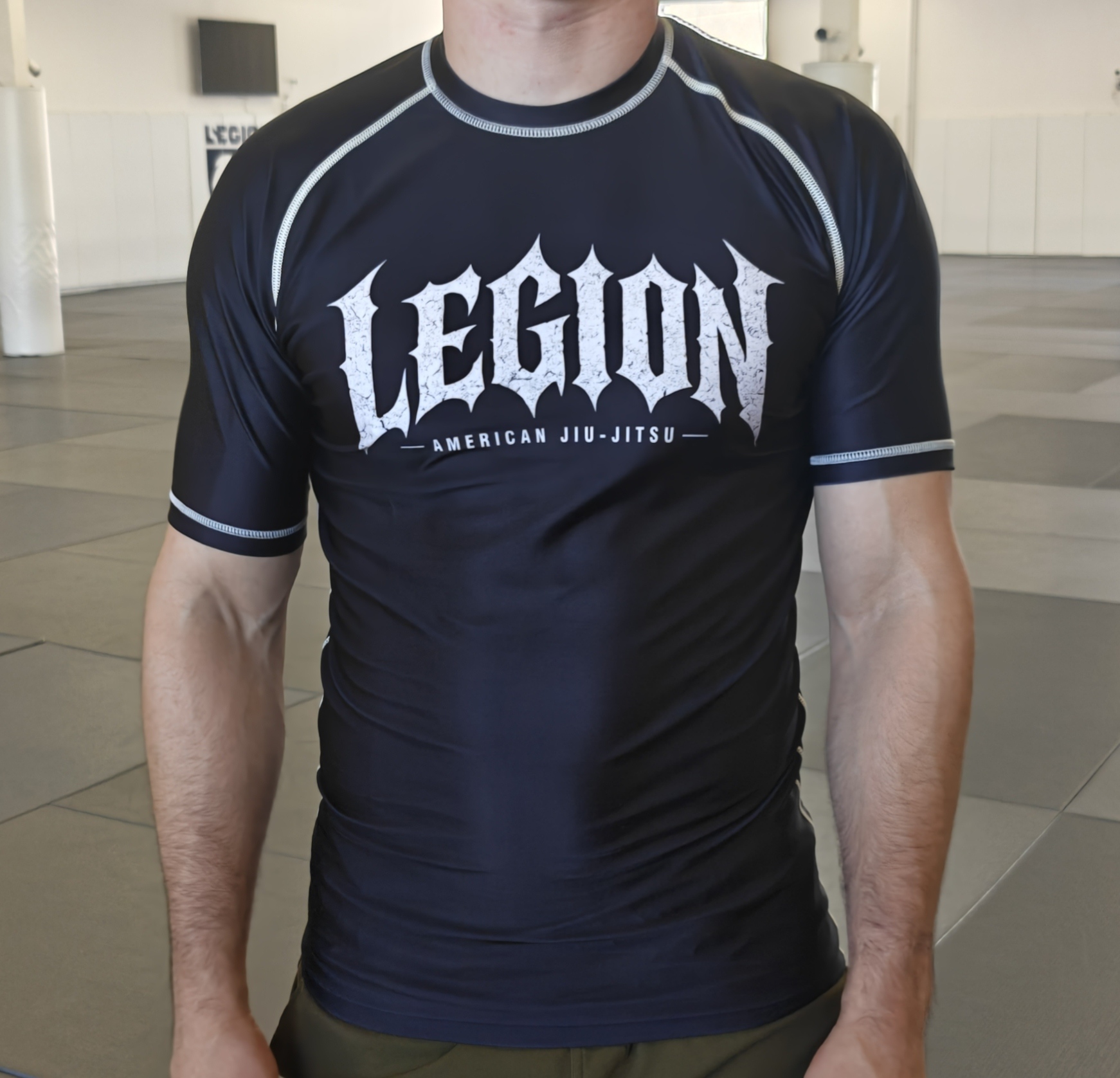 The new Legion Grunge rashguard, navy with the spiky Legion logo