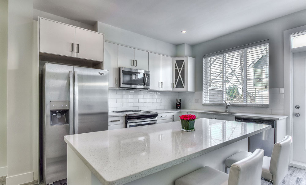Chef-ready kitchen at Briskham Hill with modern cabinetry and island