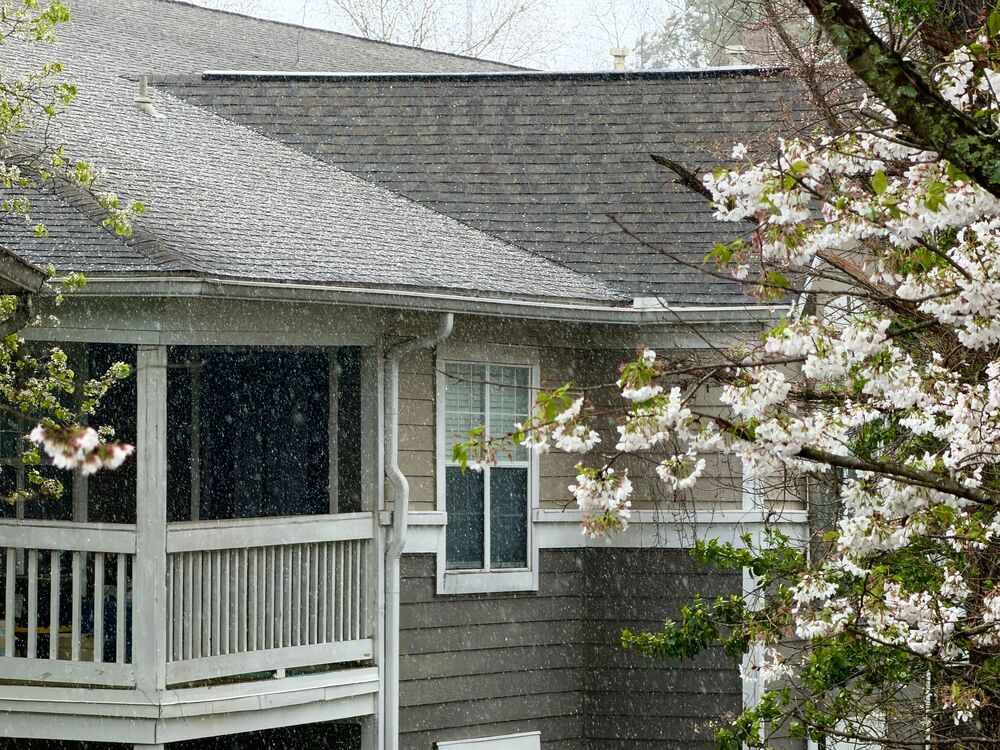 Damaged asphalt roof shingles repaired on a home in Orléans, Ontario