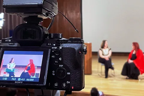 Masha Pavlova being filmed for an interview