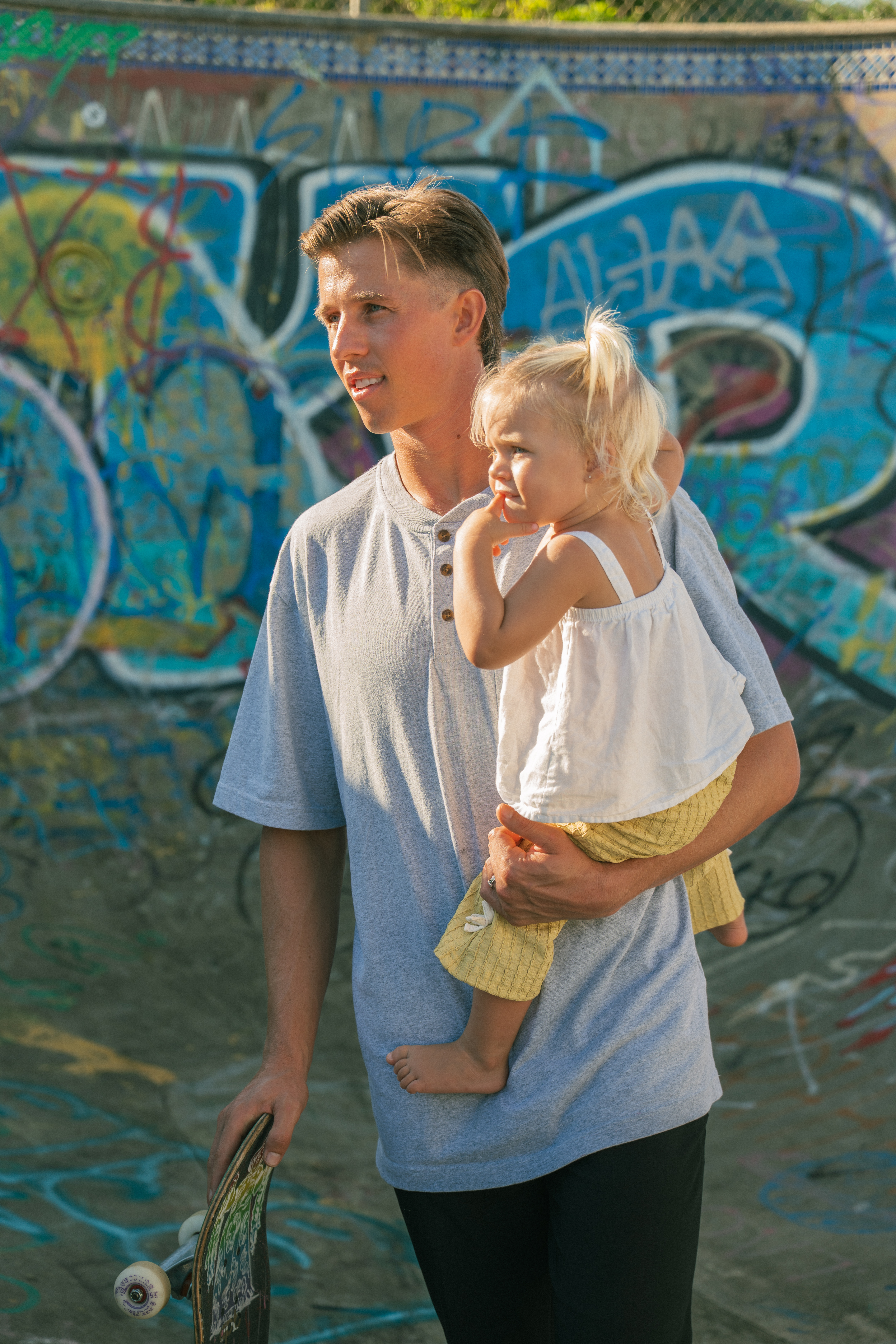 Tyson, founder of Orka Marketing, with his daughter