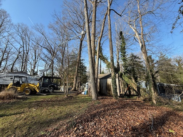 Heavy equipment performing residential land clearing in Charles City County