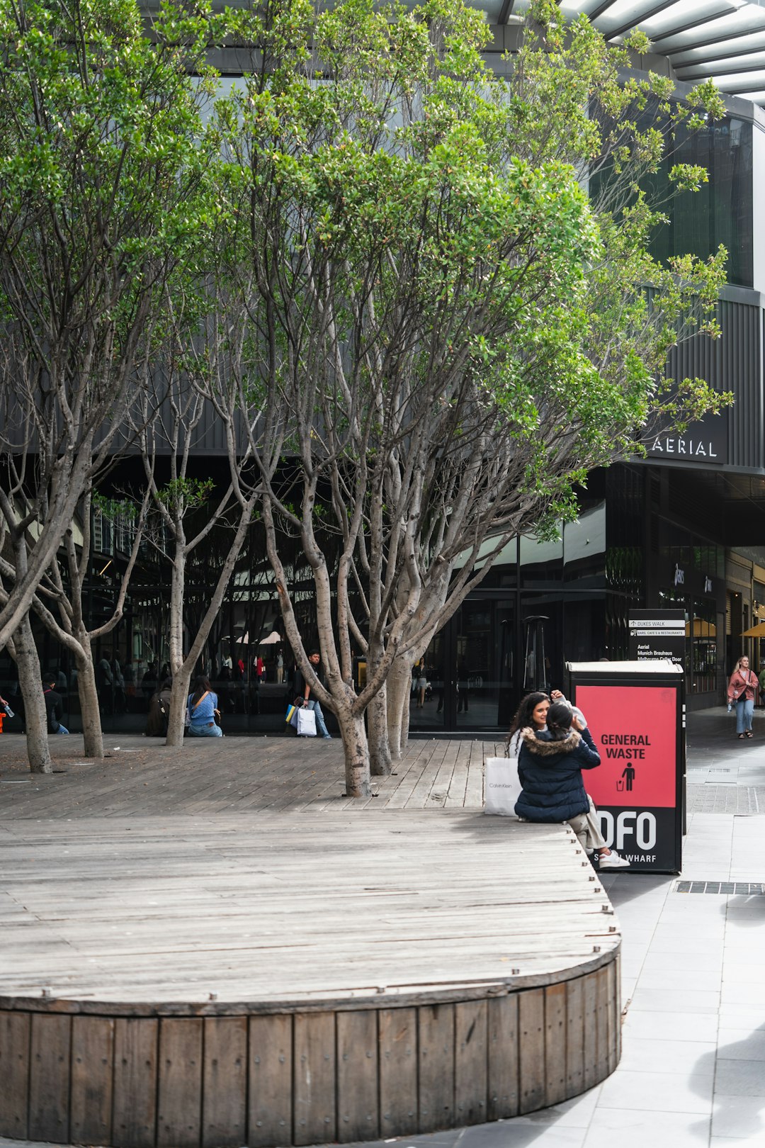 Commercial property walkway canopy trimming for pedestrian clearance