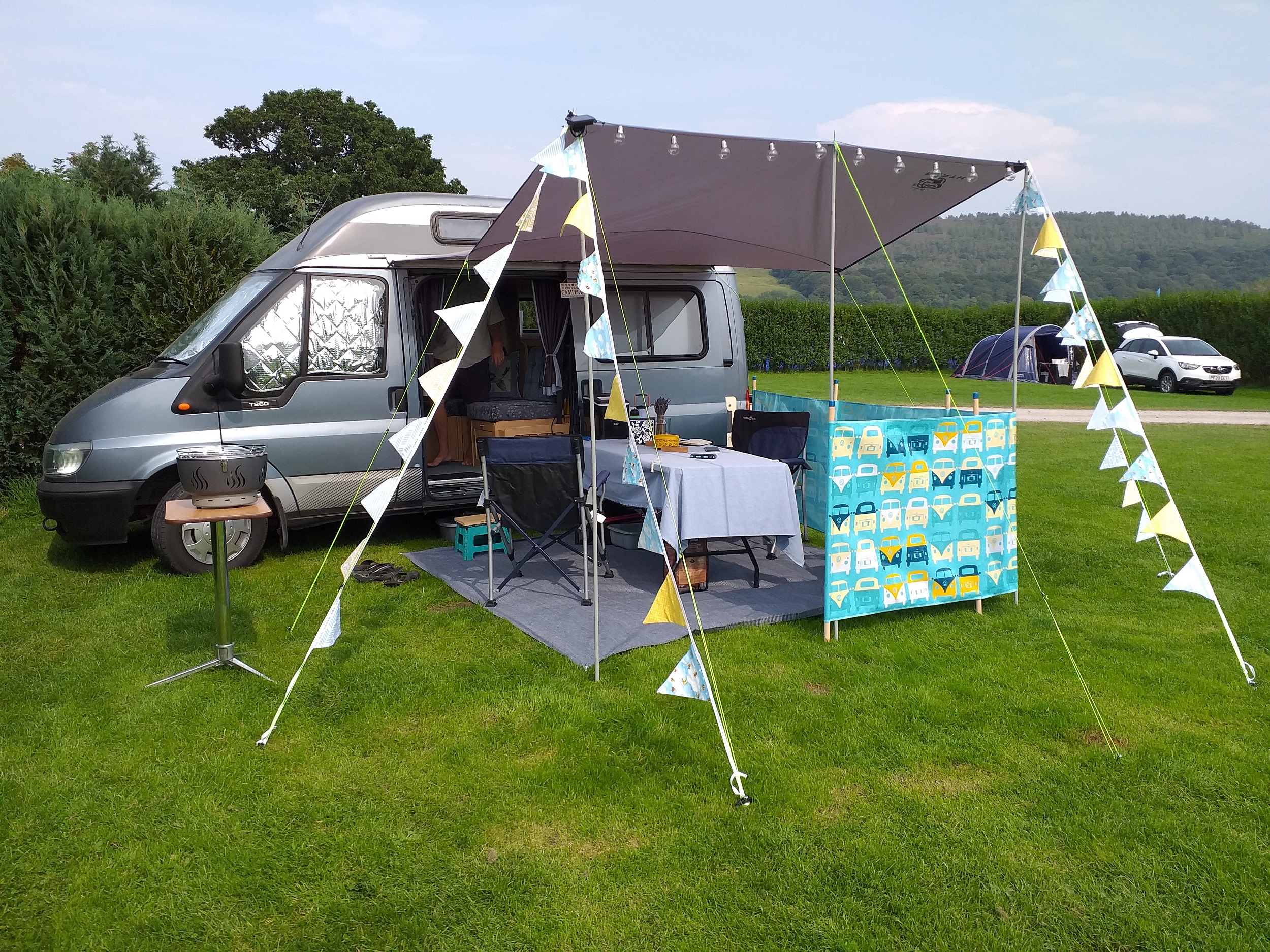 Bertha, our campervan, set up at the Riverside Campsite, Cononley
