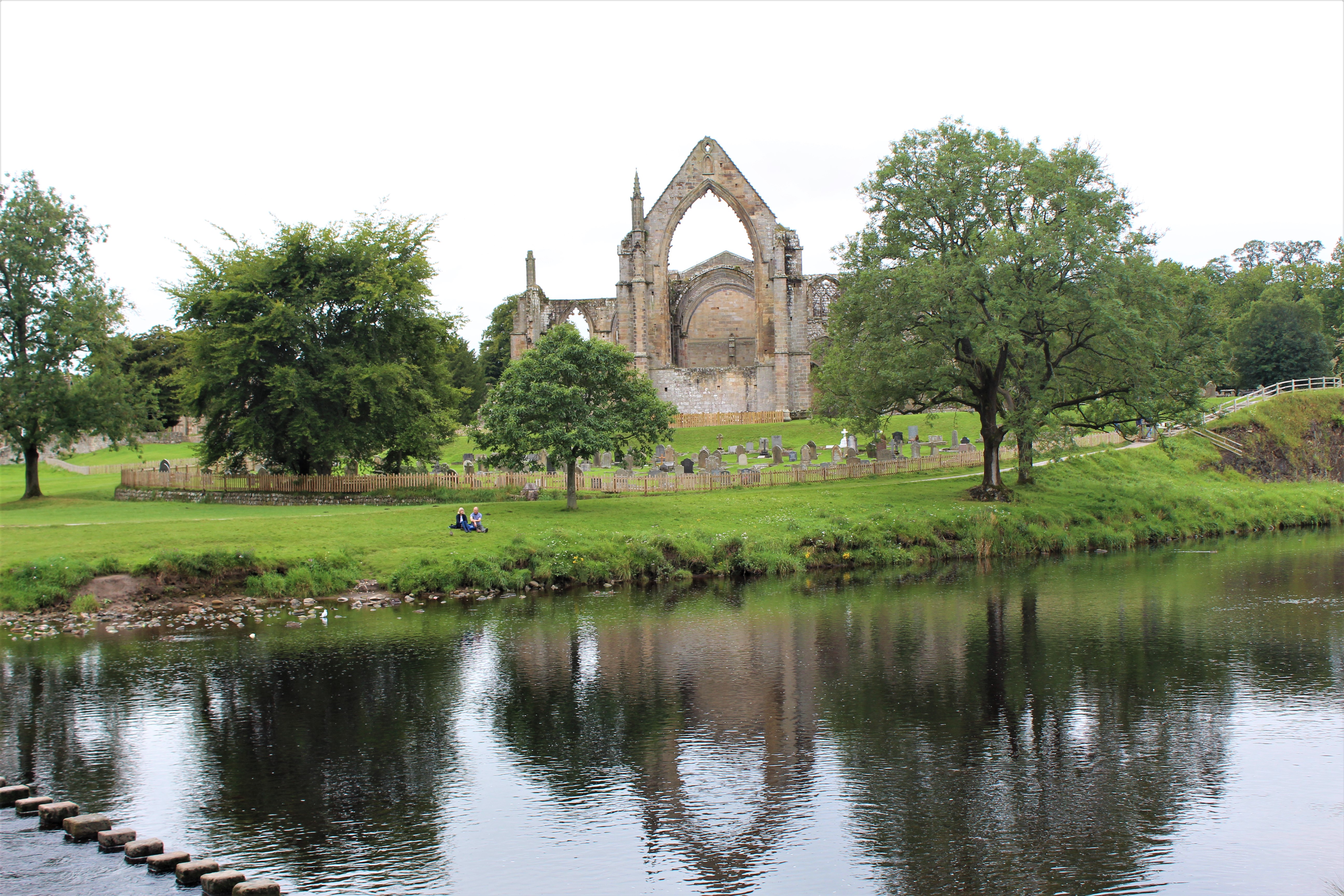 The ruins reflected in the river