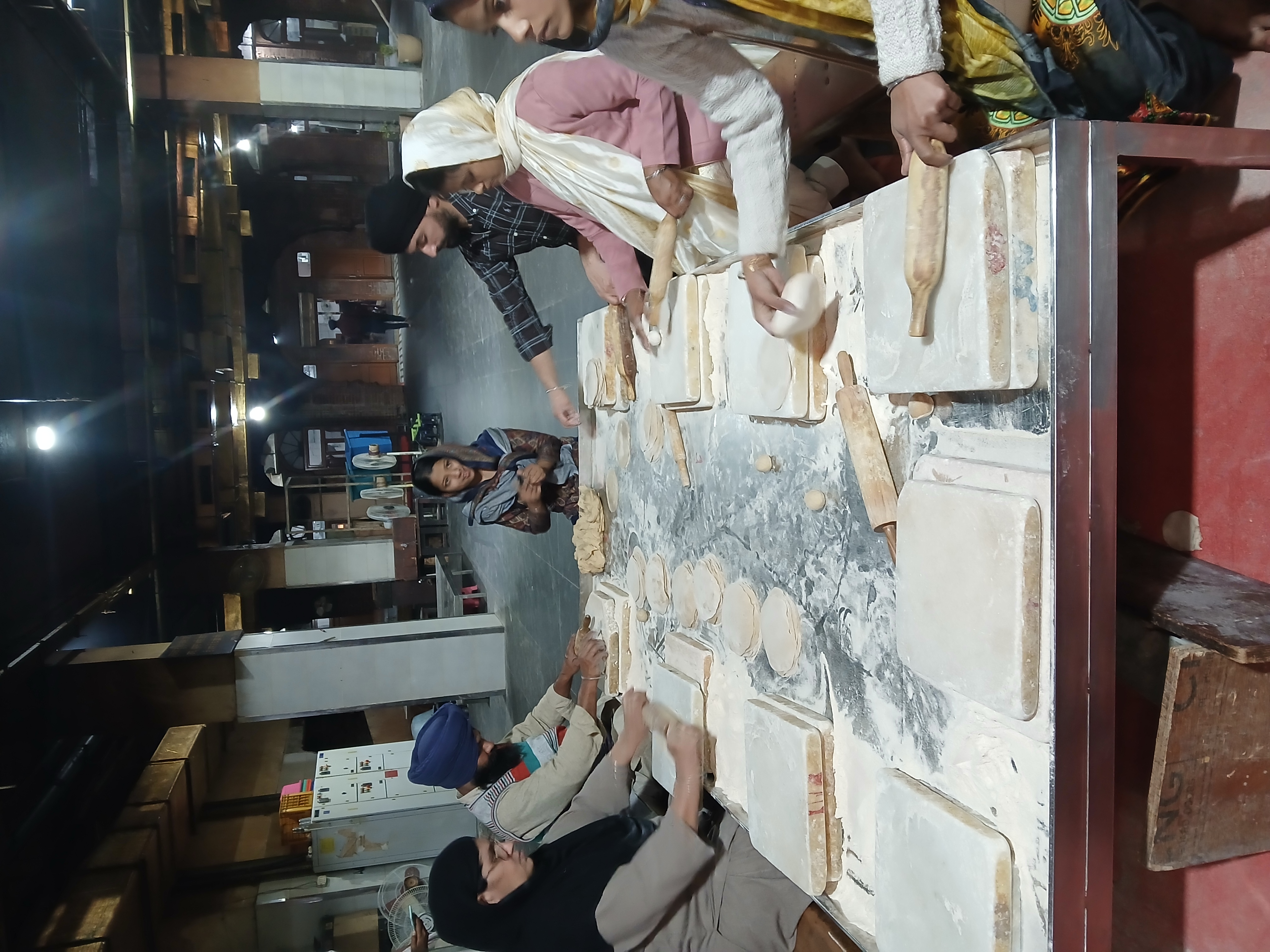 Preparing bread in the langar Preparing bread in the langar