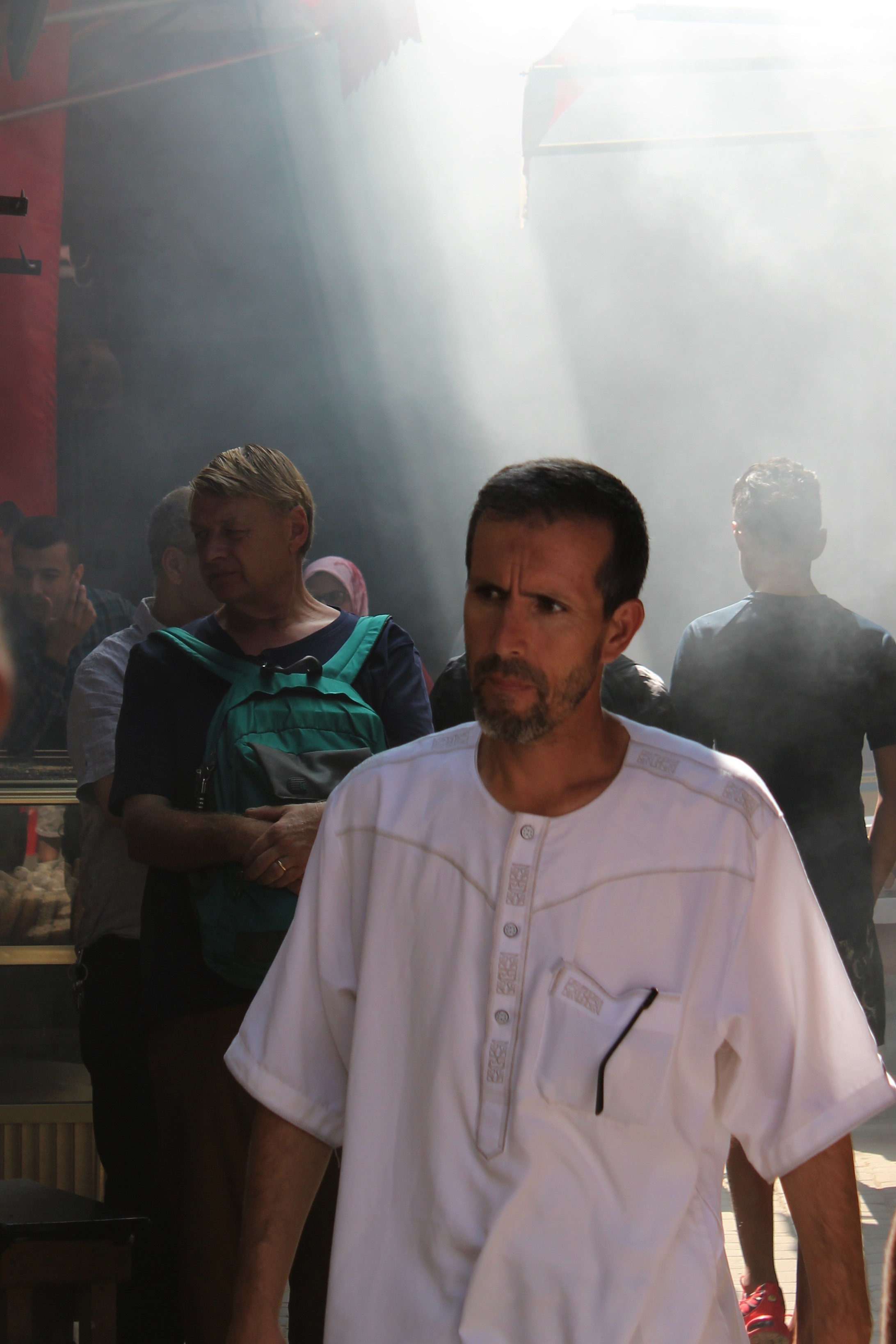Our guide walking down smoke-filled 'Camel Street'
