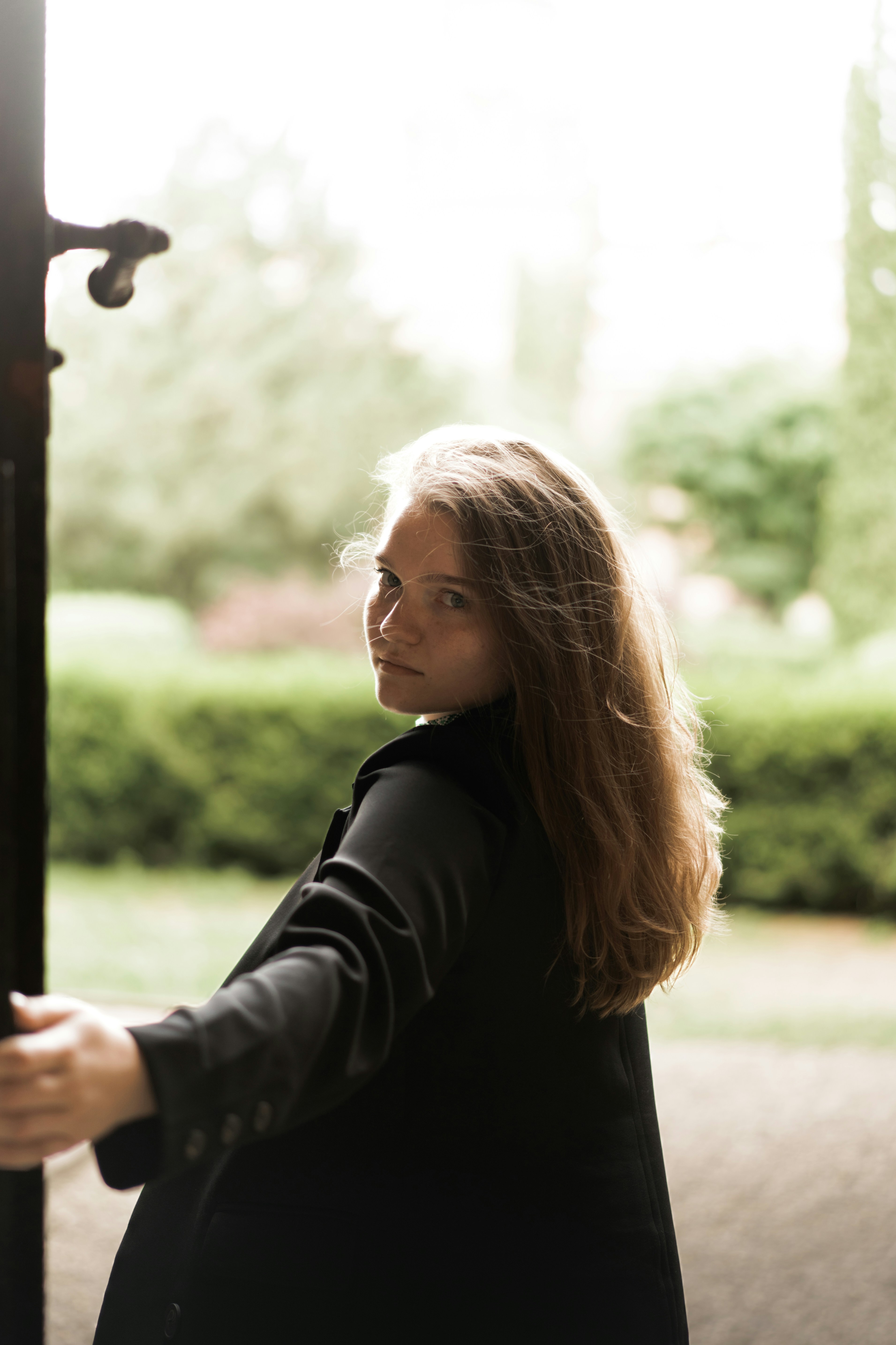 Woman leaving her house