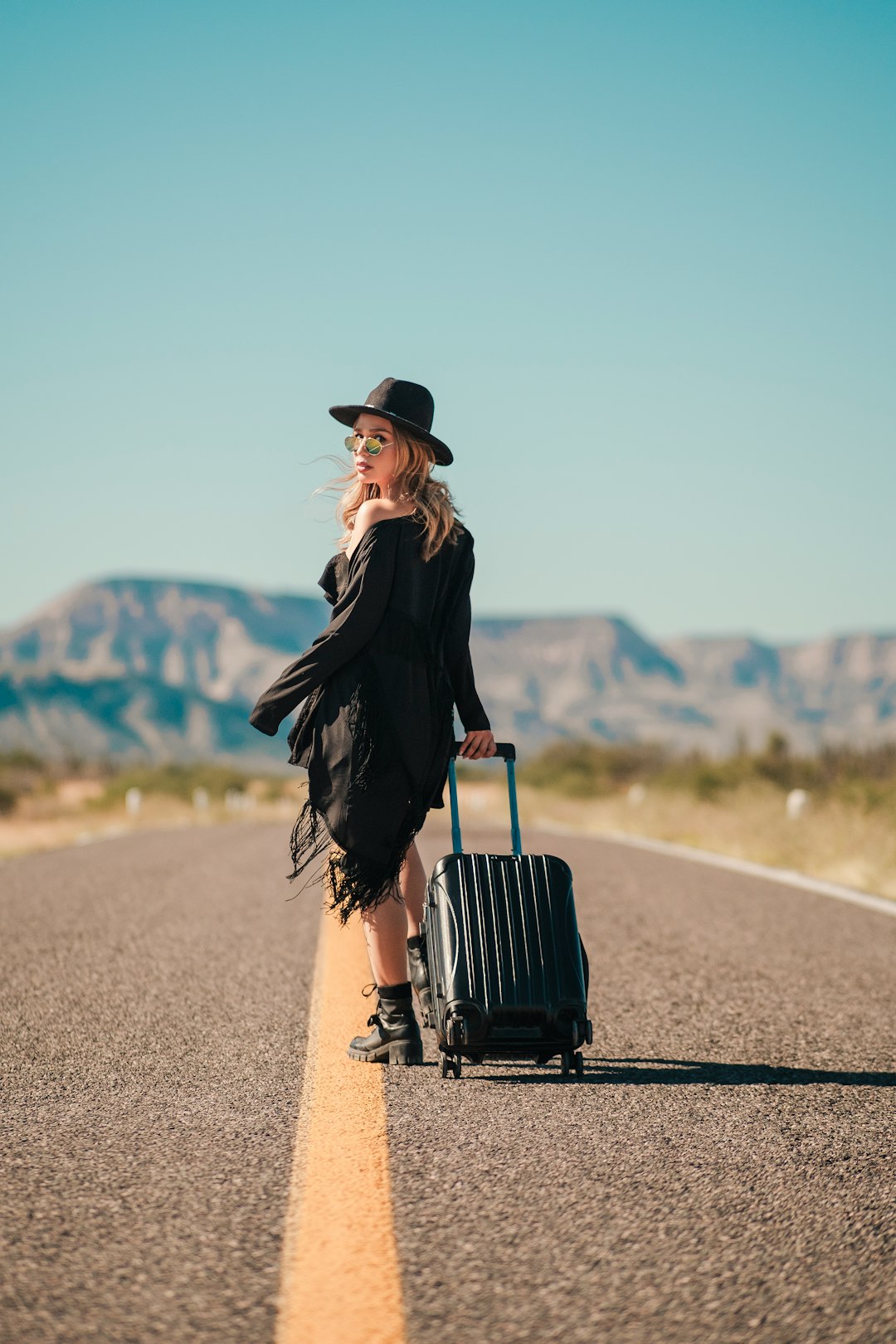 A solo female traveller on the road