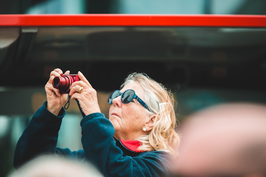Mature female traveller taking a photo