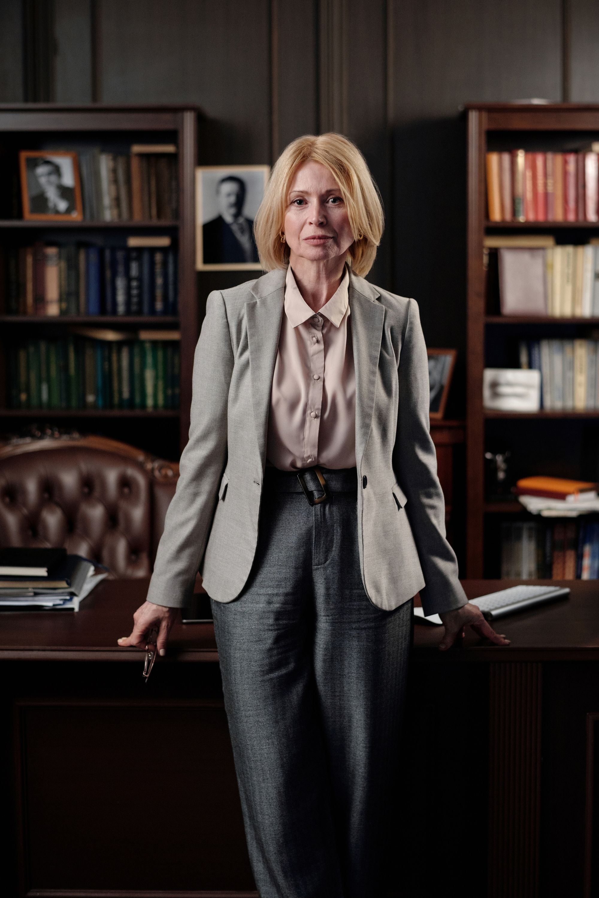 A business owner standing in her office