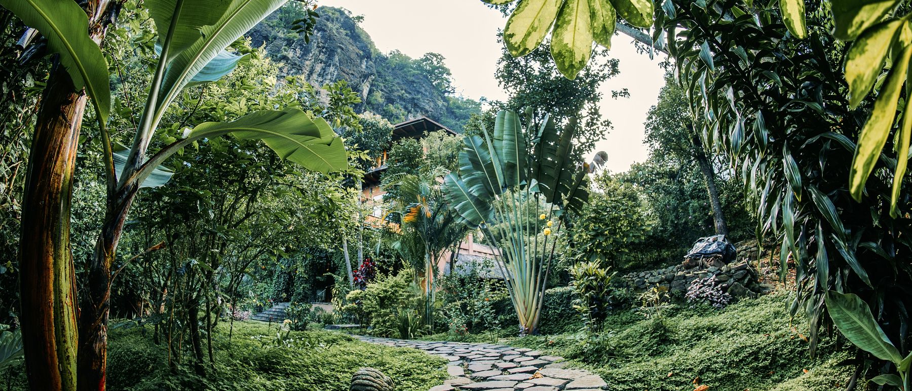 The stone path through the gardens at Maestro Valley