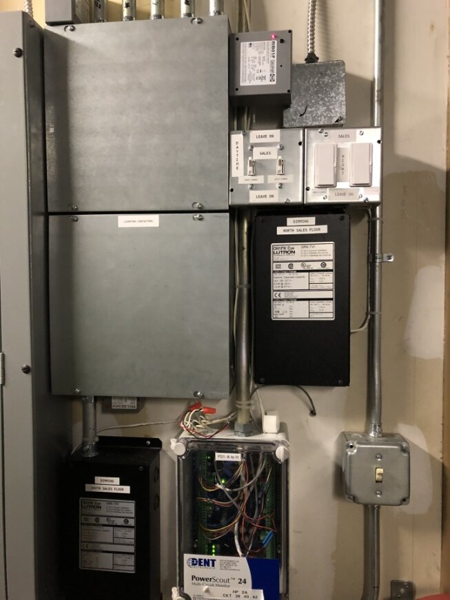 a electrical panel with wires and switches