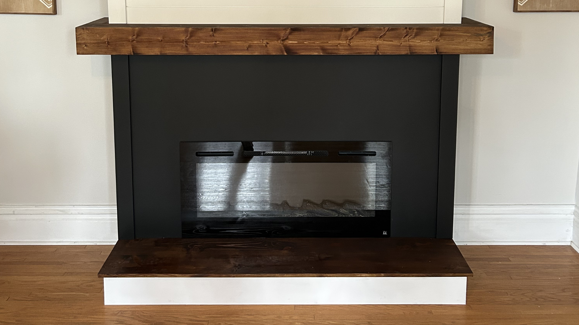 Fireplace with a wood mantel