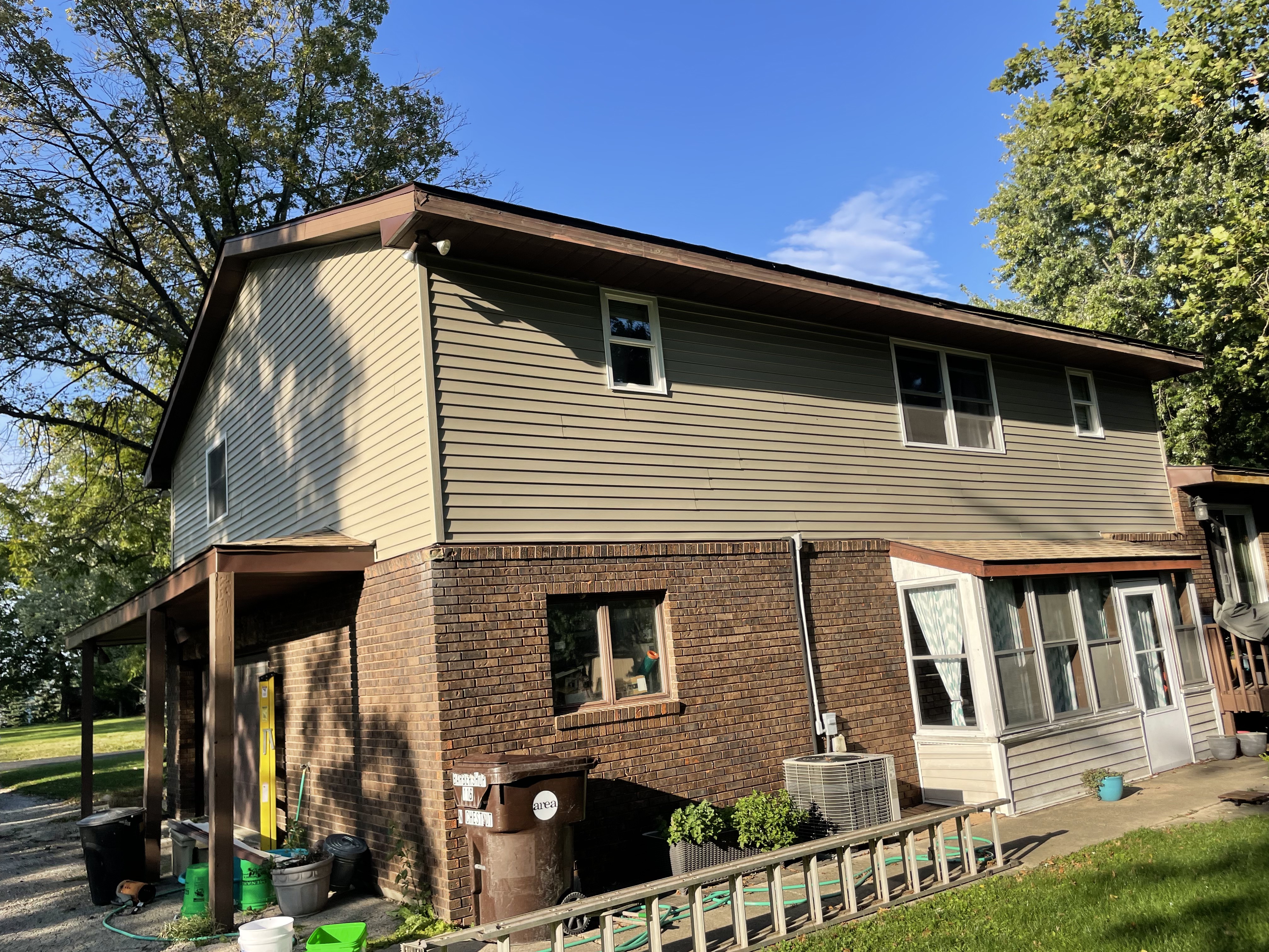Two-story home exterior, back