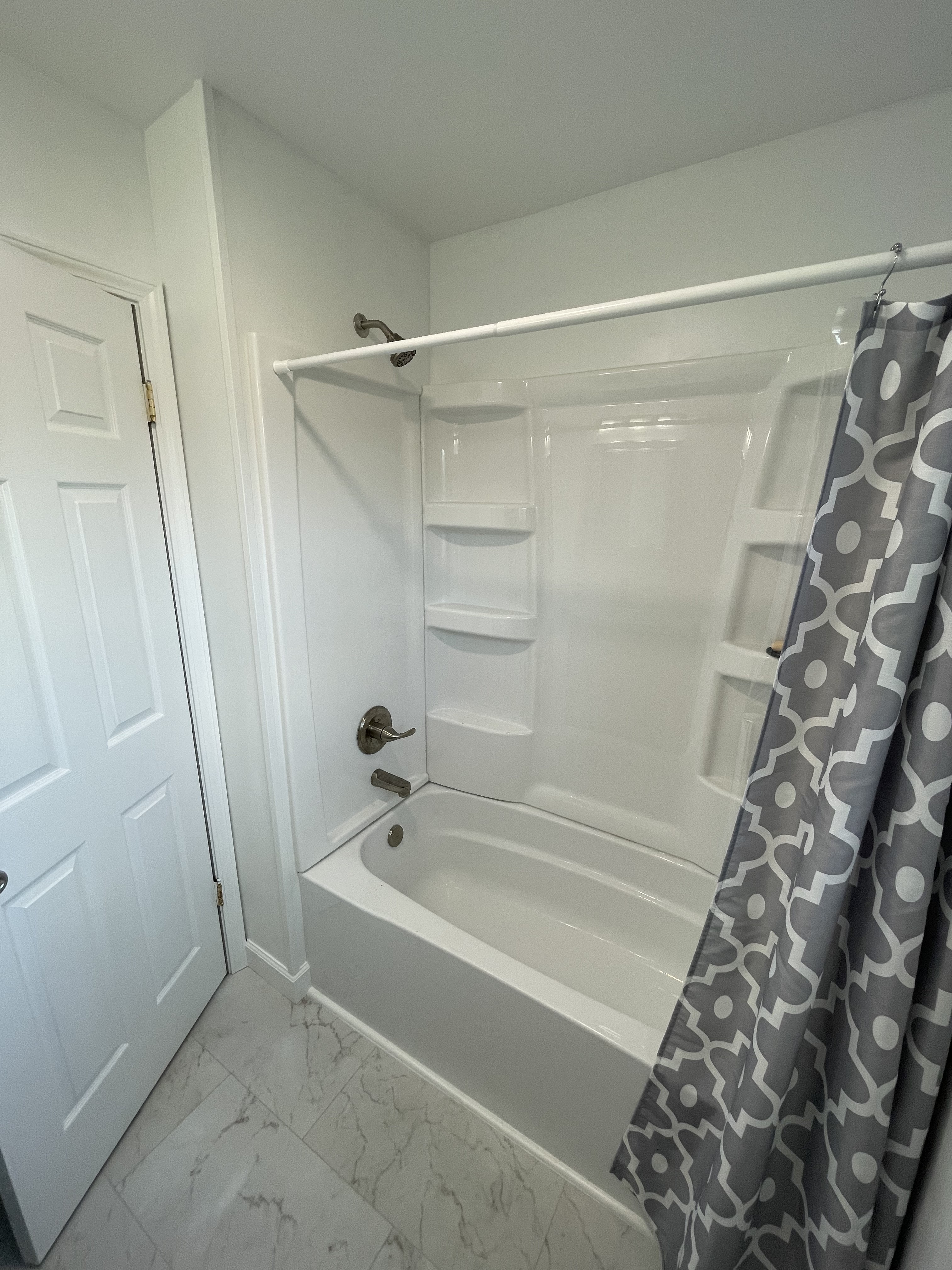 Tub and shower surround