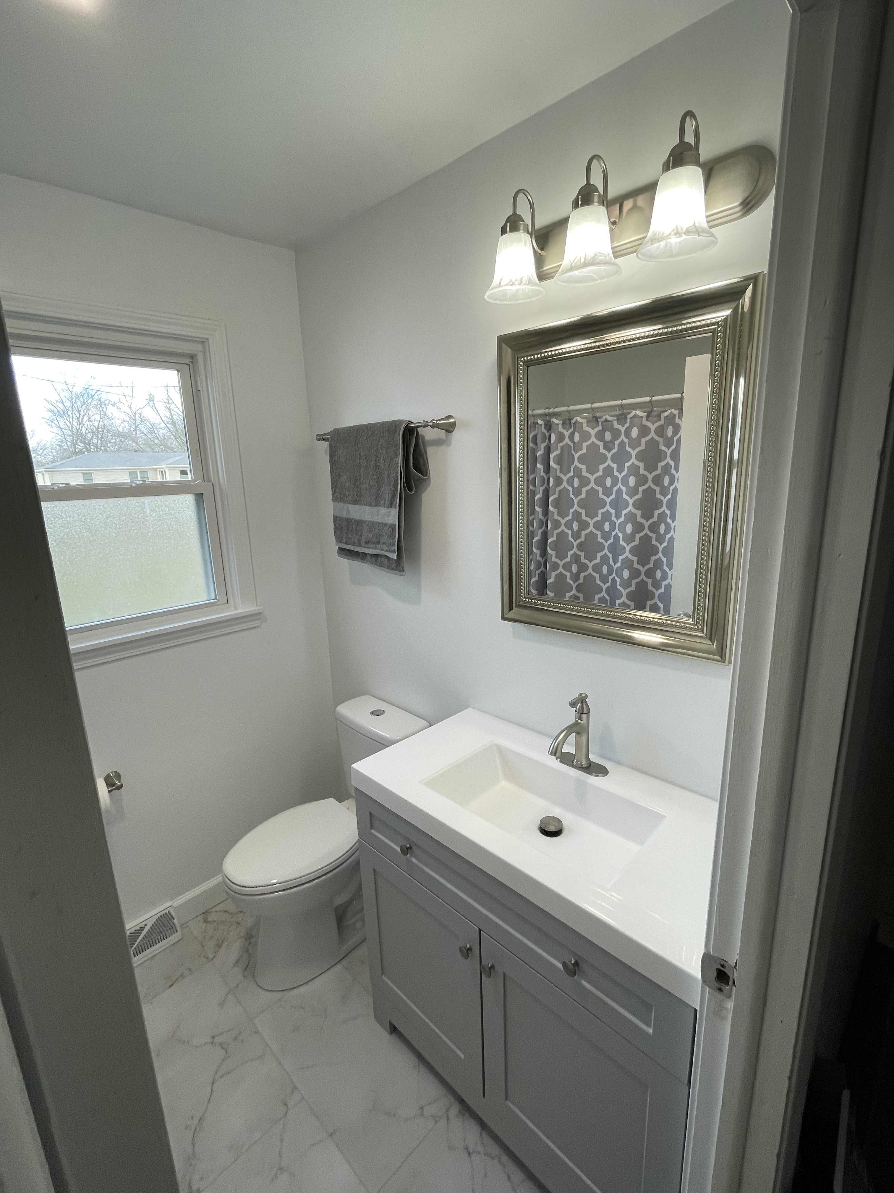 Bathroom vanity under a window