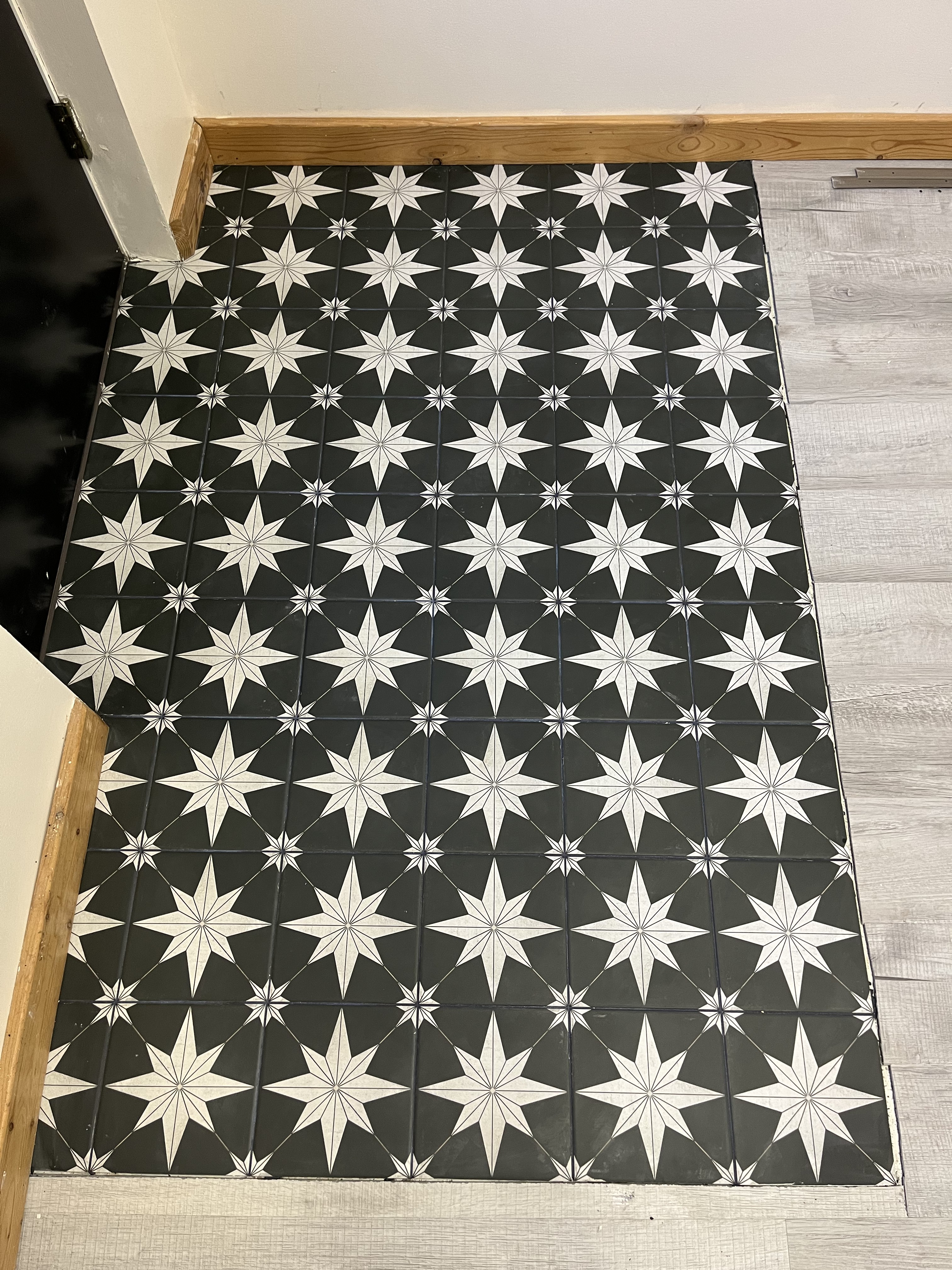 Black and white patterned tile floor